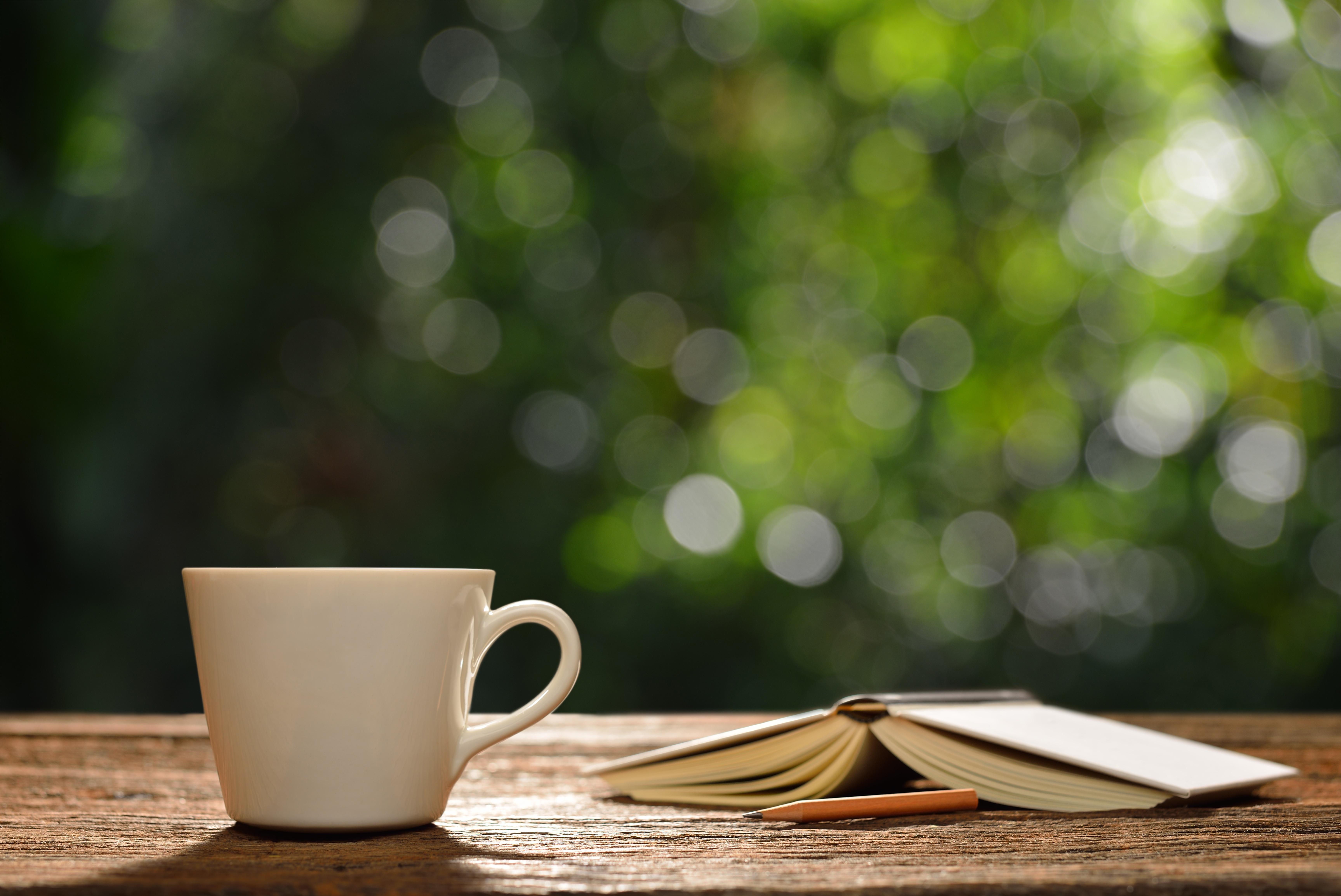 White cup on the table with an open book Desktop wallpaper 1366x768