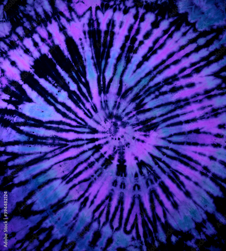 Reverse Spiral Tie Dye In Purple Blue. Hippie Tie Dye Pattern Texture Background Wallpaper