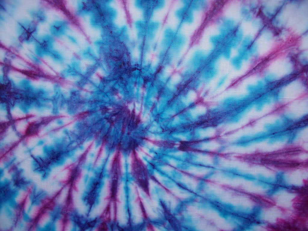Download Add a splash of color to your wardrobe with Purple Tie Dye! Wallpaper