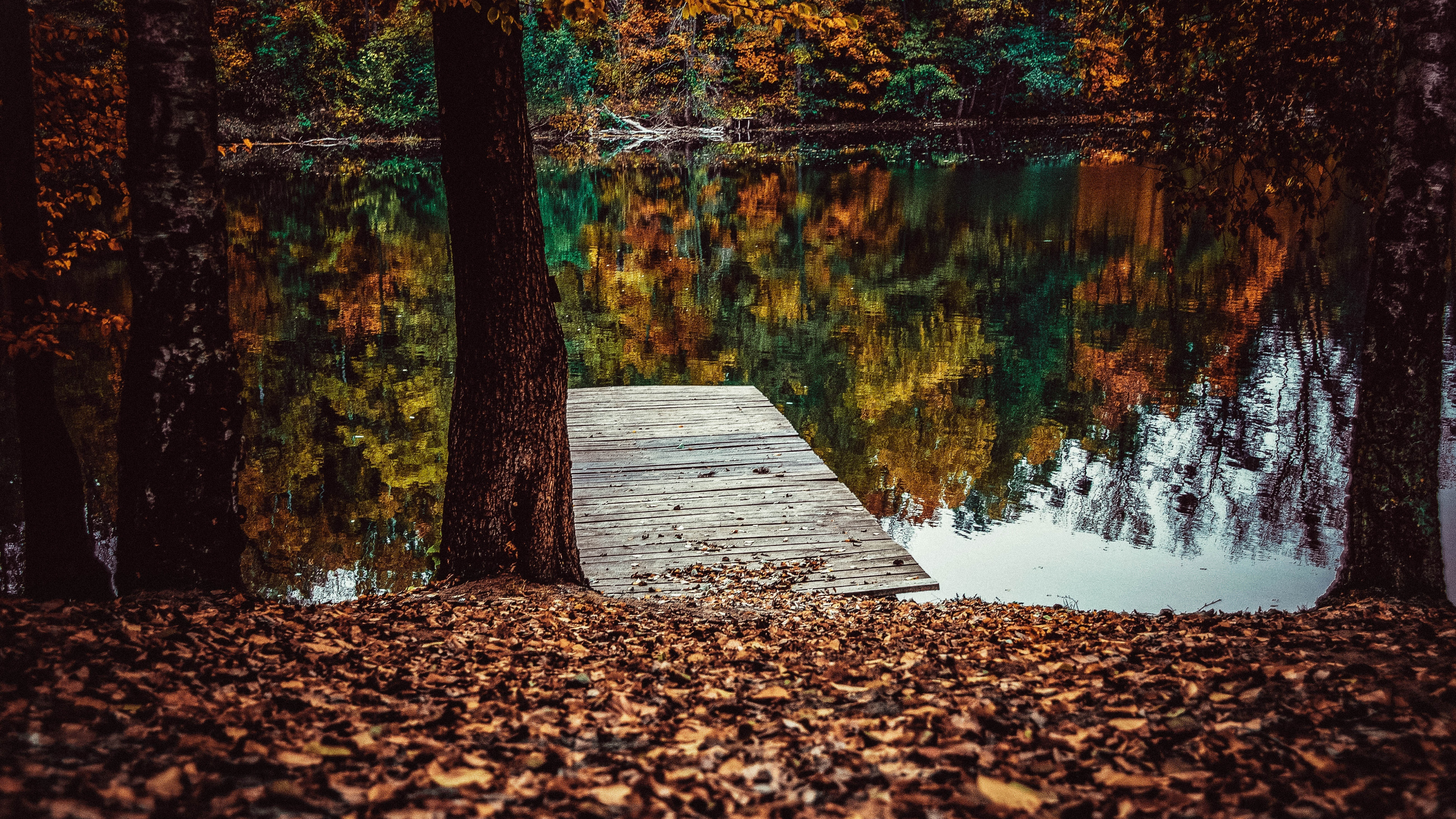 Download wallpaper 5120x2880 pier, lake, fall, leaves, autumn, lake, reflections 5k wallpaper, 5120x2880 5k background, 15753