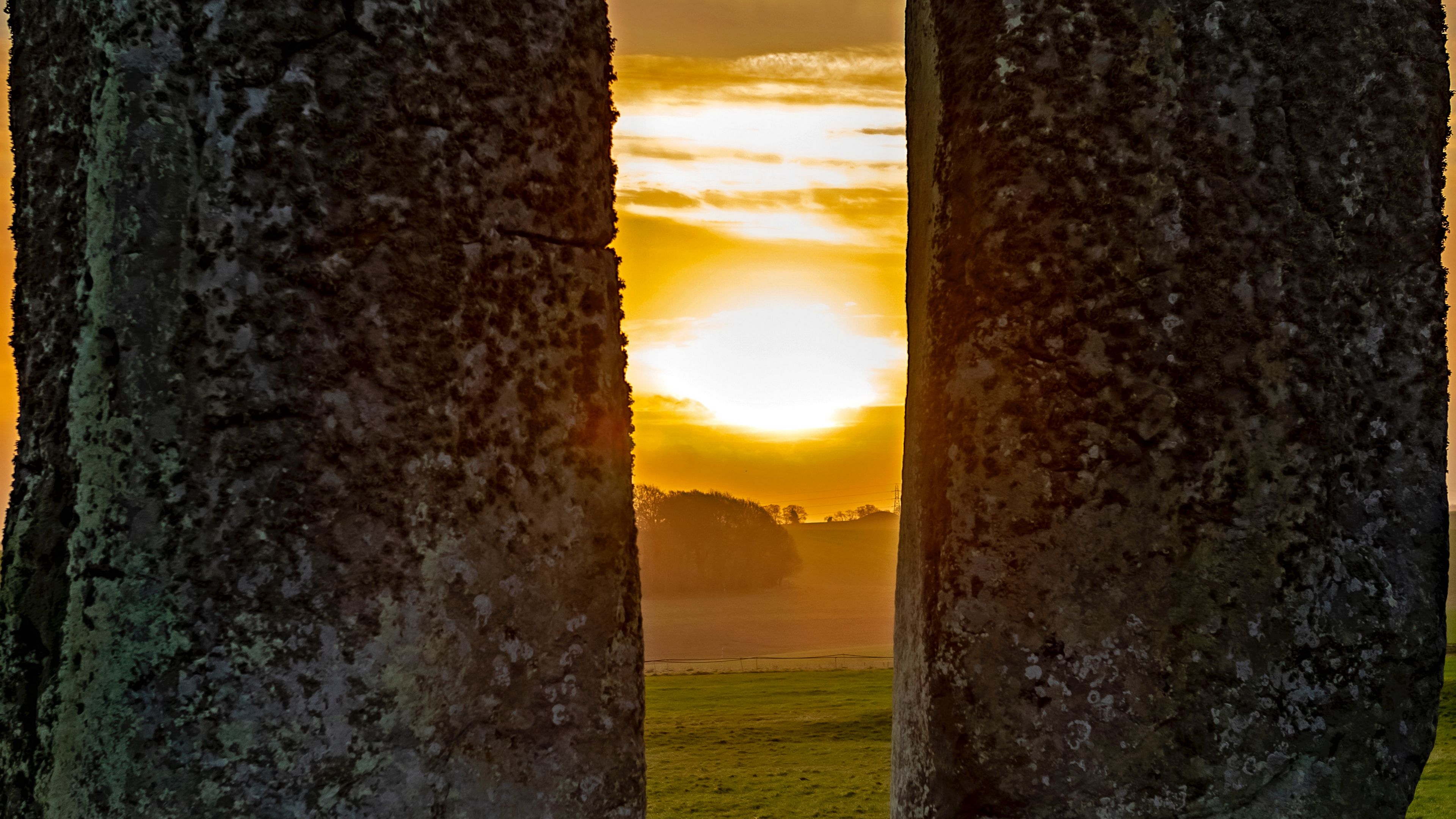 Download wallpaper 3840x2160 stones, megalith, sunset, stonehenge, england 4k uhd 16:9 HD background