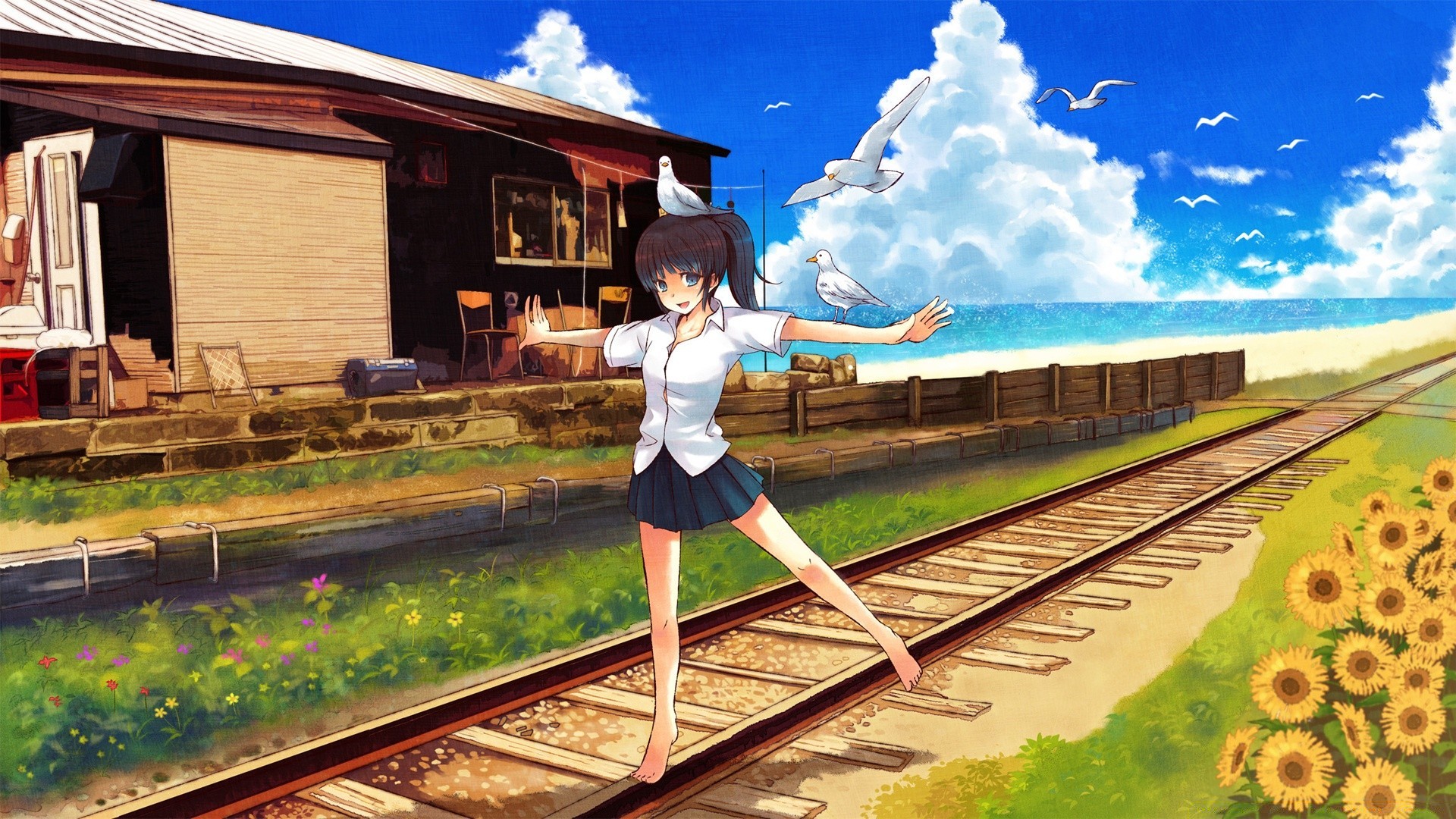 A girl walks on the railway