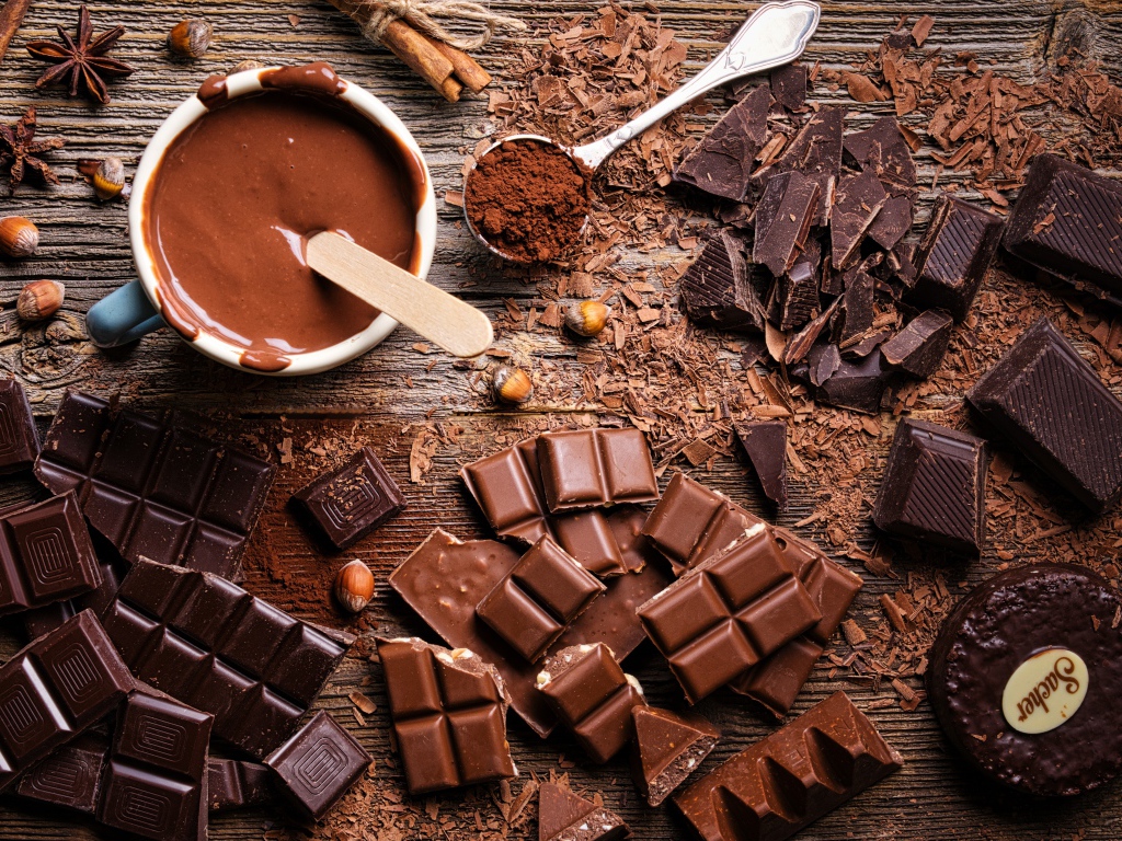 Bars of black and milk chocolate on the table Desktop wallpaper 1024x768