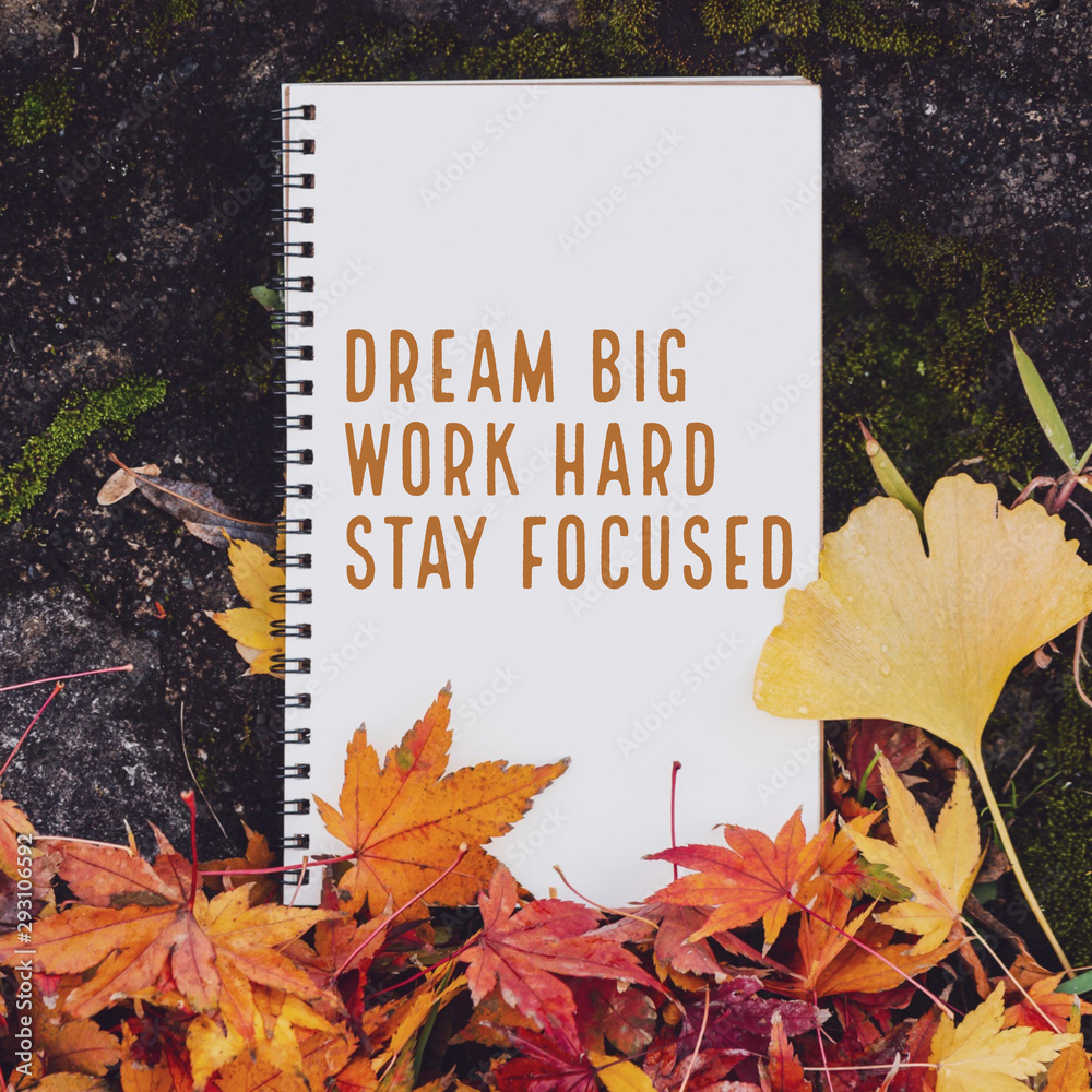 Inspirational and motivation quote notebook with maple leaf in autumn background with vintage filter