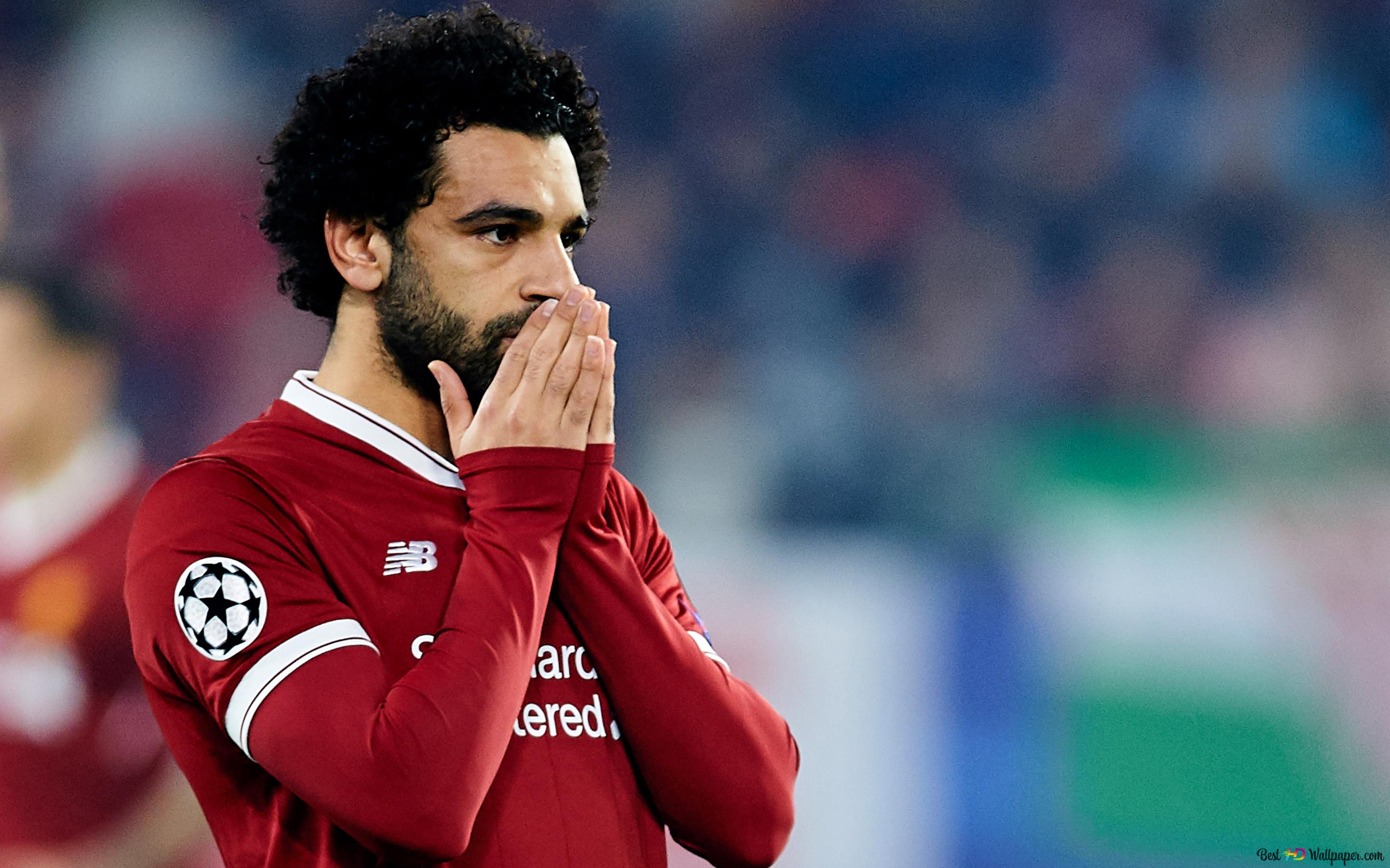 Mohamed Salah holding his mouth with his hands among the crowd at the stadium 4K wallpaper download