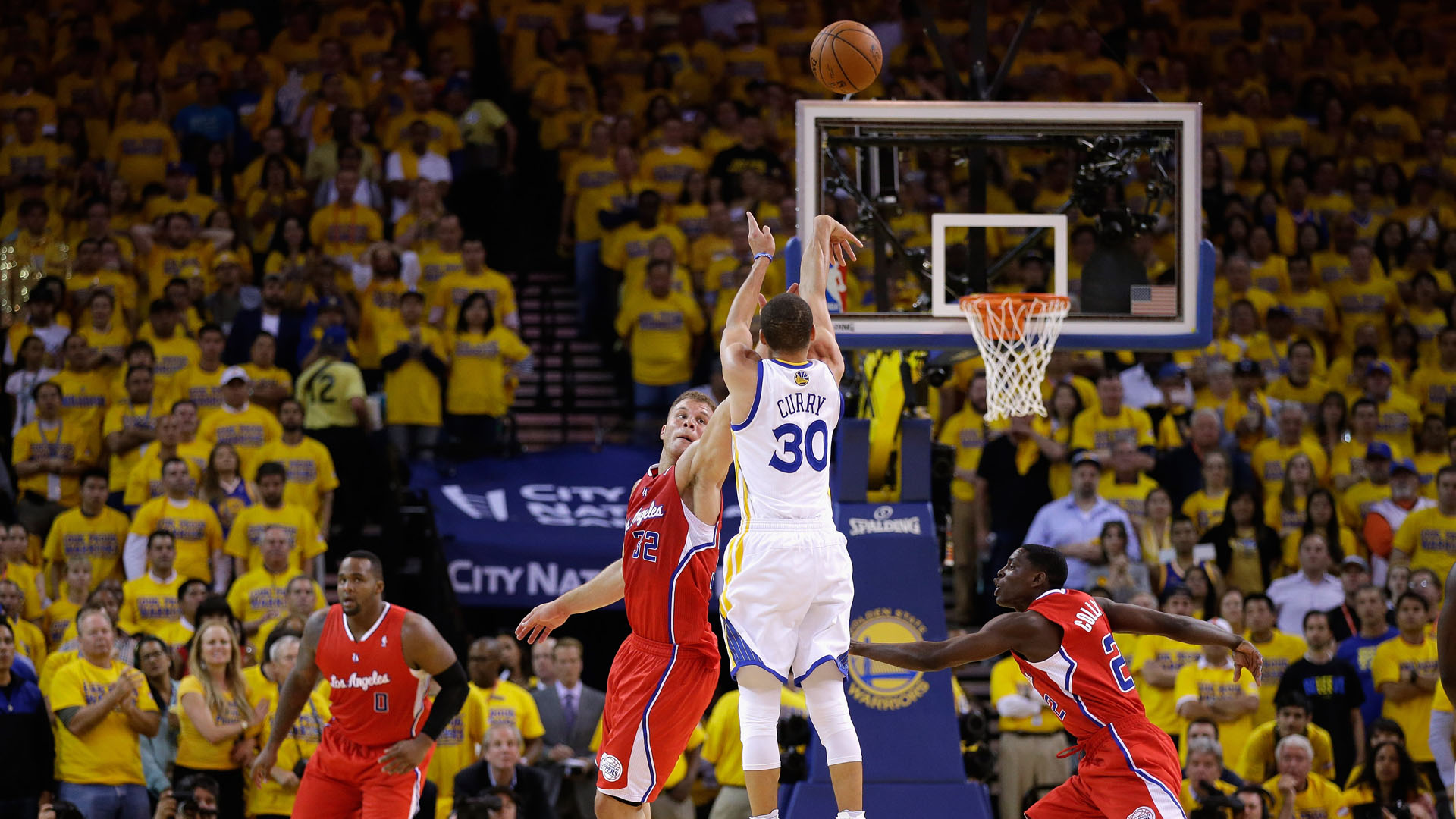 Download Steph Curry Shooting A Three-Pointer Wallpaper