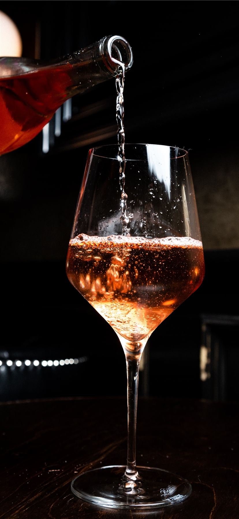 liquor pours in wine glass iPhone 11 Wallpaper Free Download