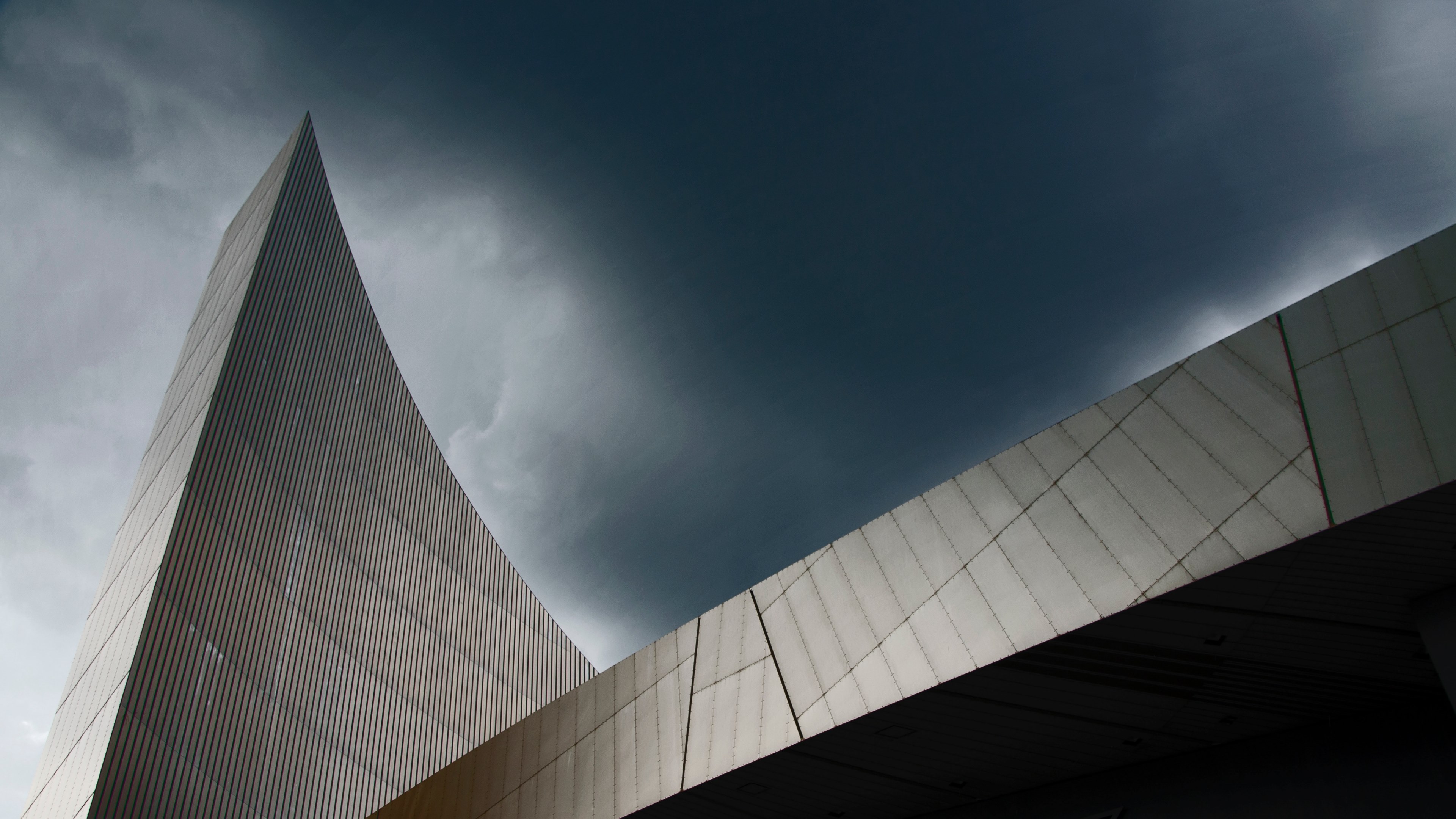 Wallpaper / the silver curved facade of imperial war museum north in manchester, silver curved facade 4k wallpaper free download