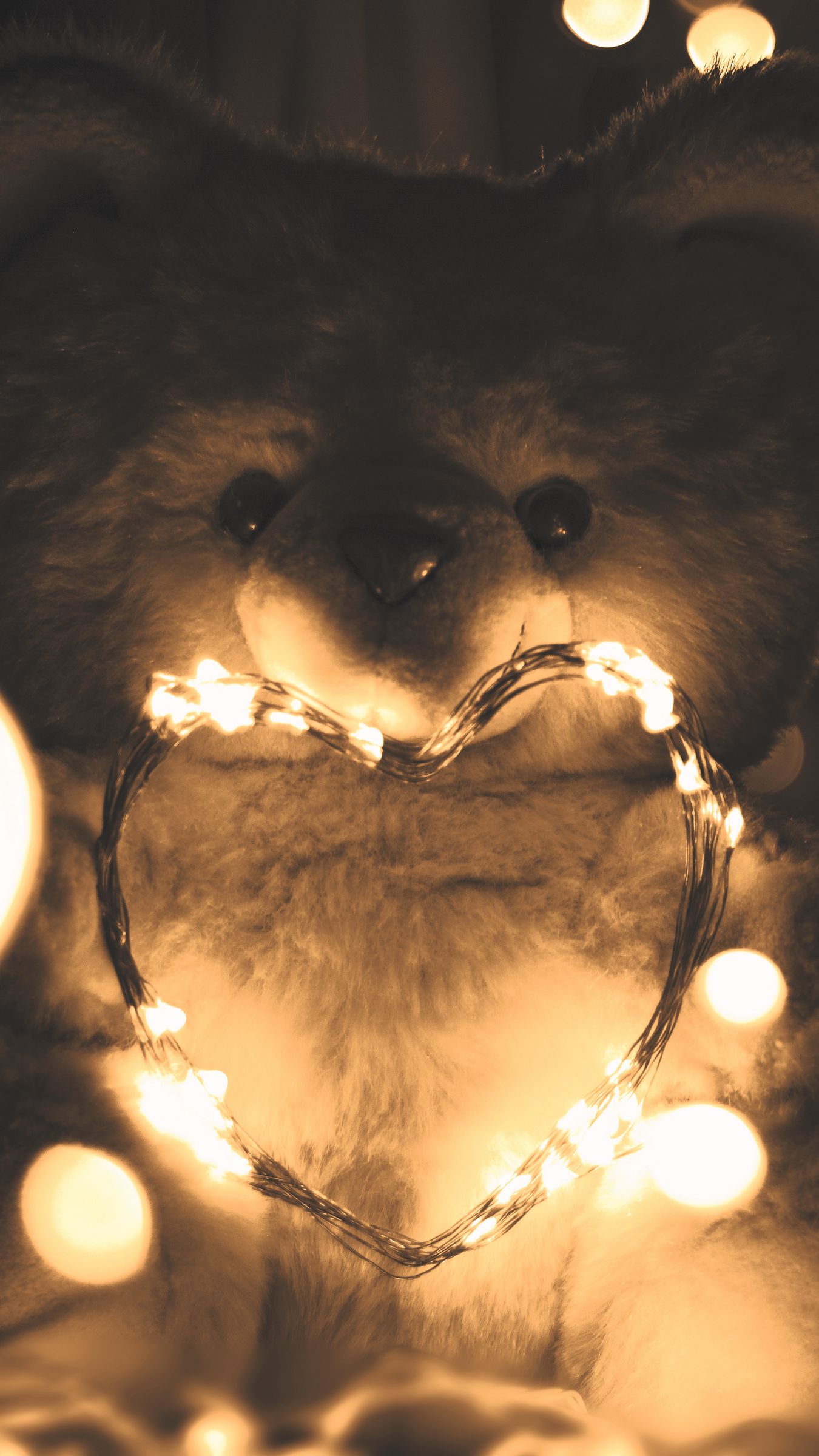 Download wallpaper 1350x2400 teddy bear, heart, garland, love, lights iphone 8+/7+/6s+/for parallax HD background