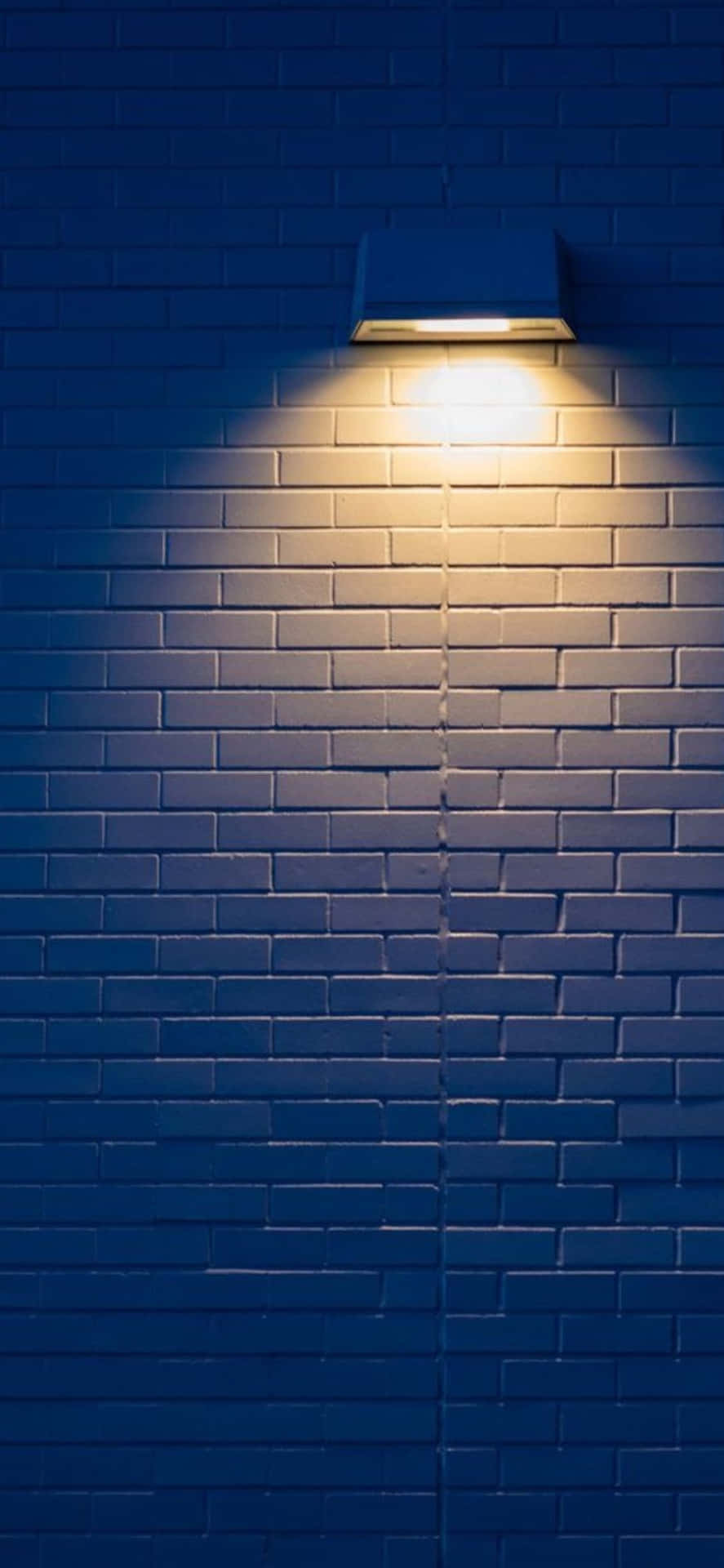 Download Lamp On A Brick Wall iPhone X Minimal Background