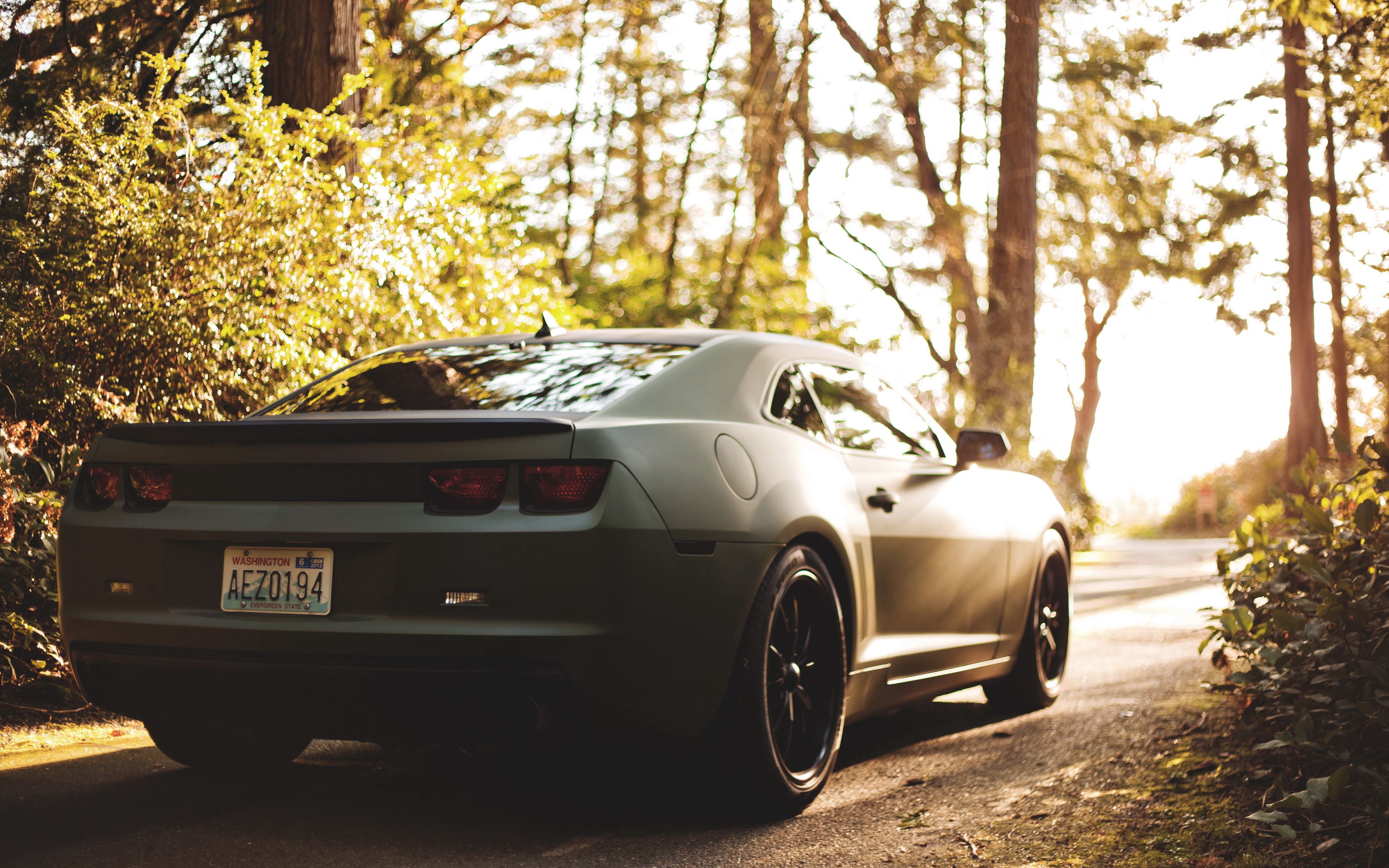 Download wallpaper 3840x2400 bokeh, chevrolet, camaro, matte, black 4k ultra HD 16:10 HD background