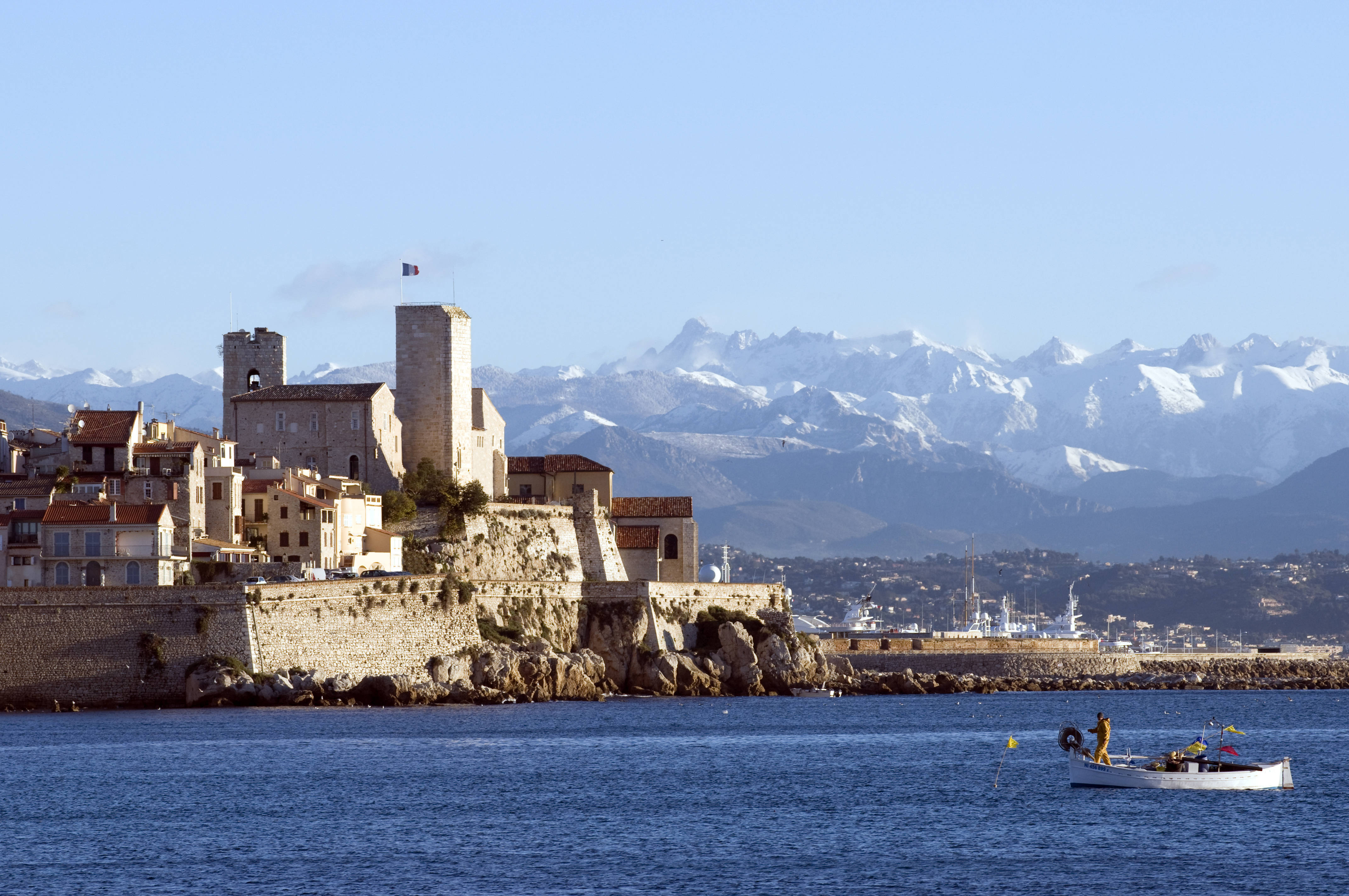Castle on a background of mountains in the resort of Antibes, France Desktop wallpaper 1280x800