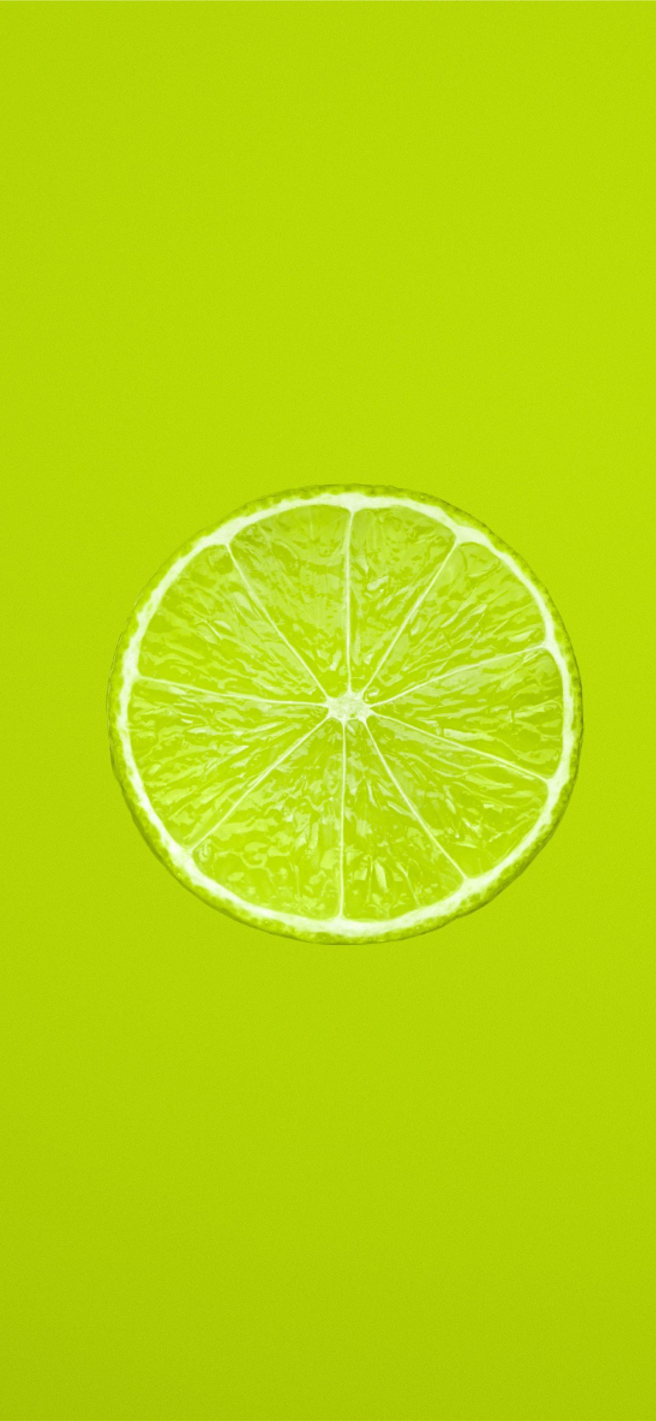 yellow lemon fruit on green background iPhone Wallpaper Free Download