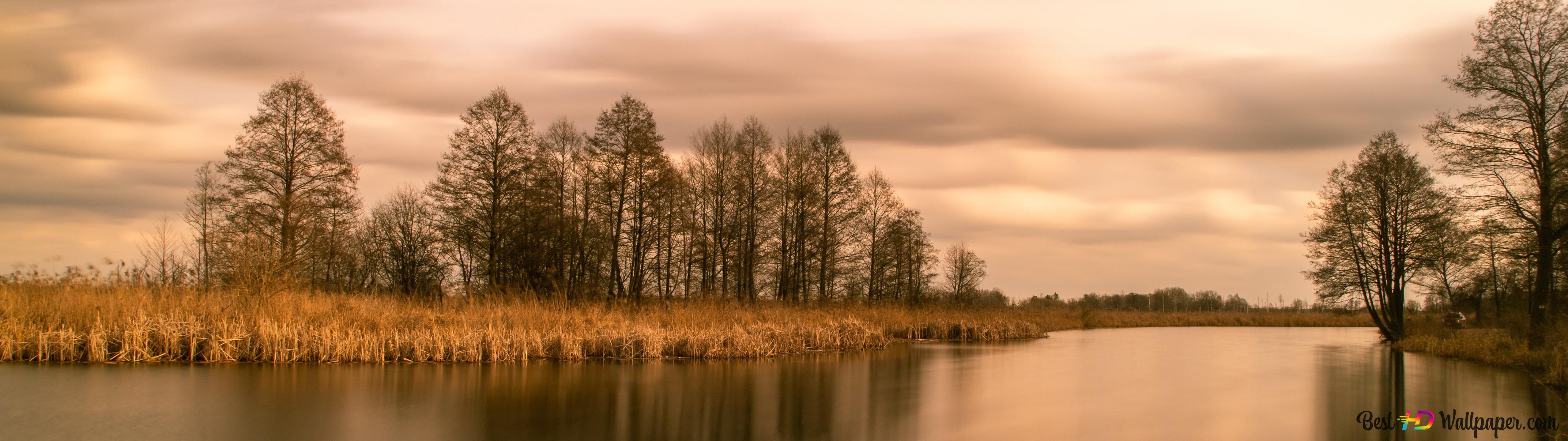 Autumn beauty of trees reflected in the lake 4K wallpaper download