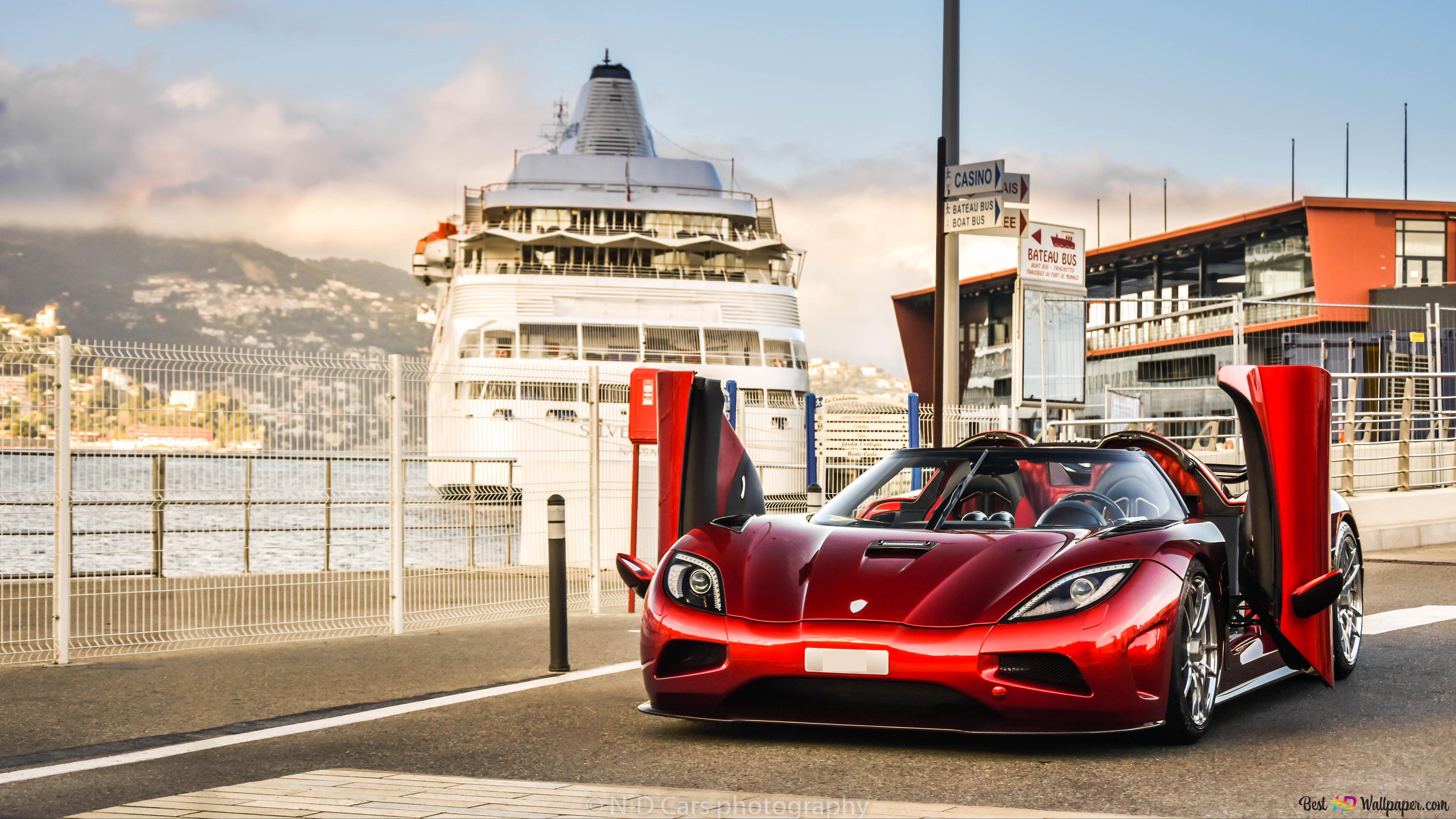 Red Koenigsegg Agera sport car parked on road side 4K wallpaper download