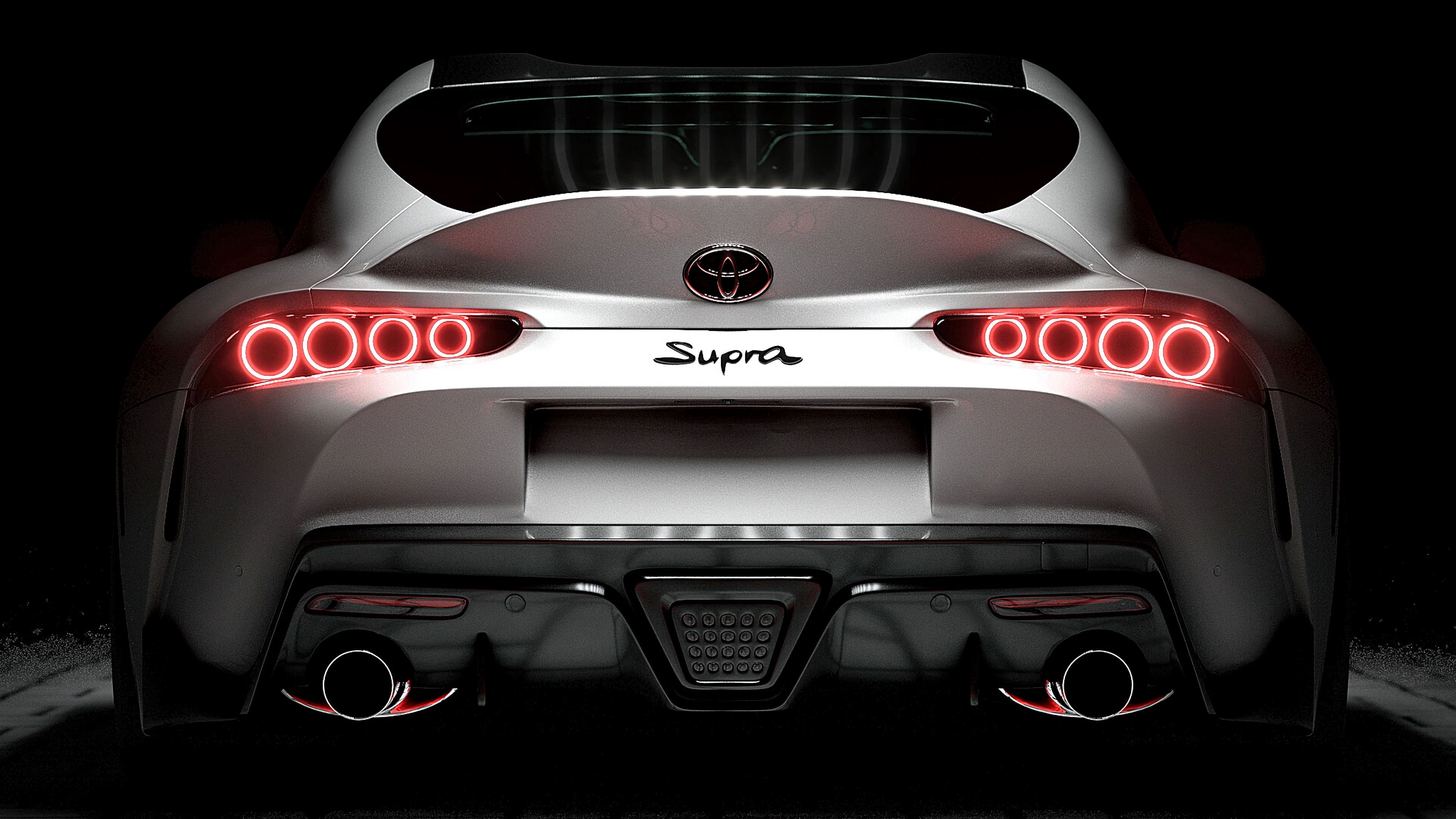 Download wallpaper 3840x2160 toyota supra, toyota, sportscar, white, rear view, backlight 4k uhd 16:9 HD background