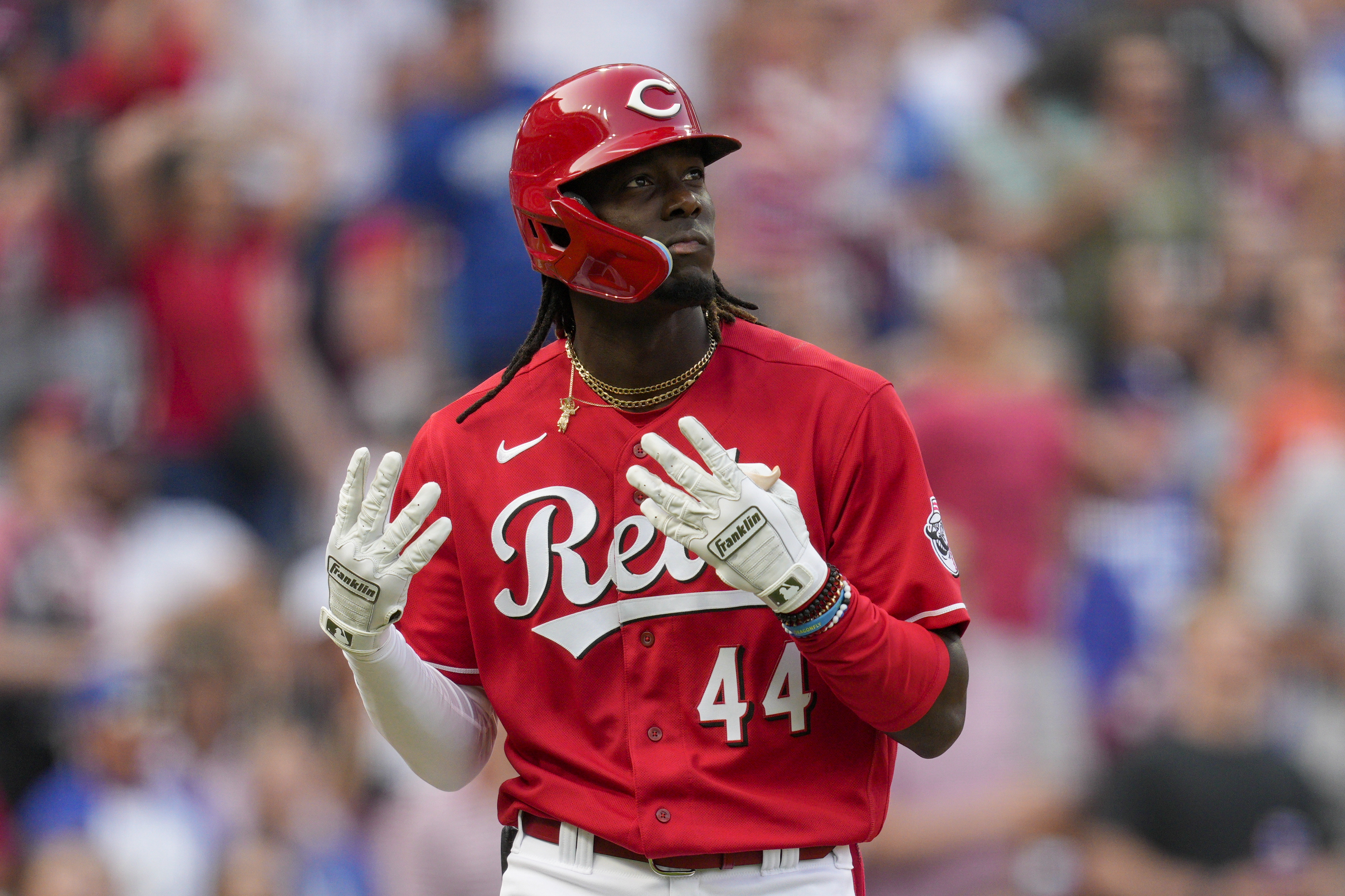 Reds' De la Cruz hits 1st big league homer, then triples