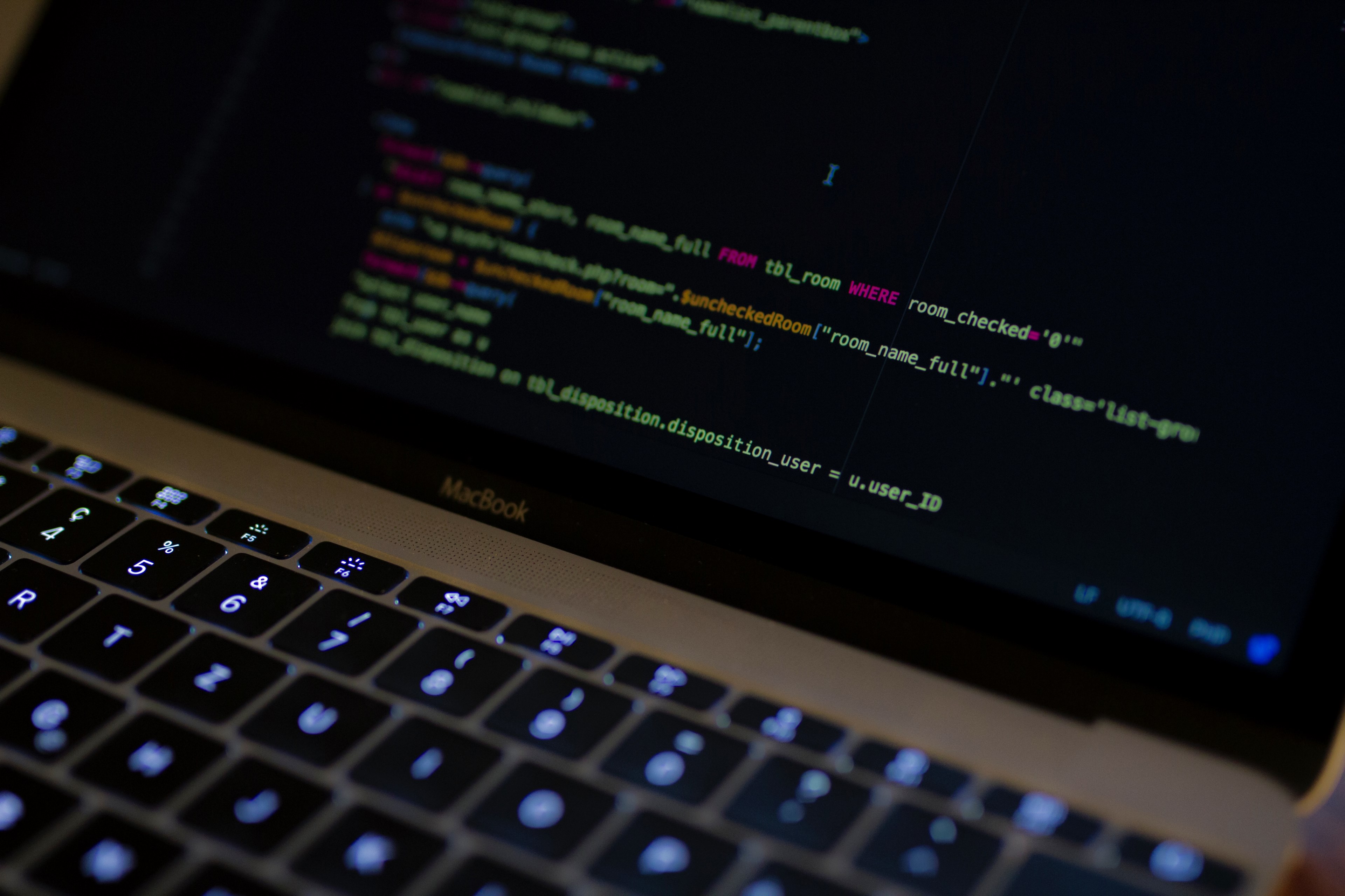 Wallpaper / colorful lines of code on a macbook screen, coding sql in php 4k wallpaper free download