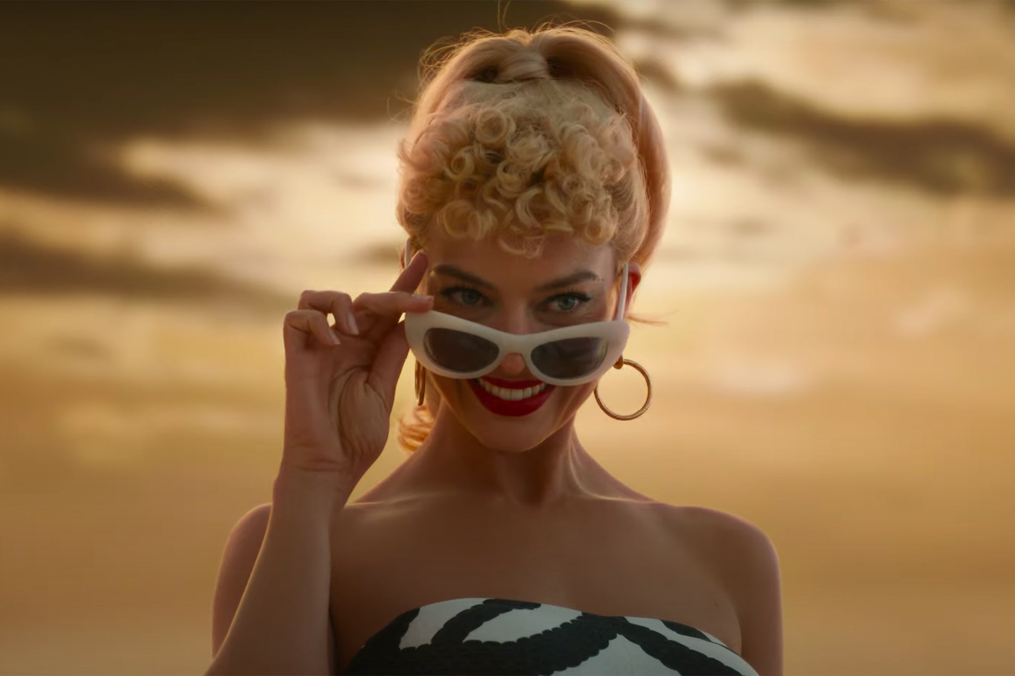 In a New 'Barbie' Trailer, Reality Bites Margot Robbie