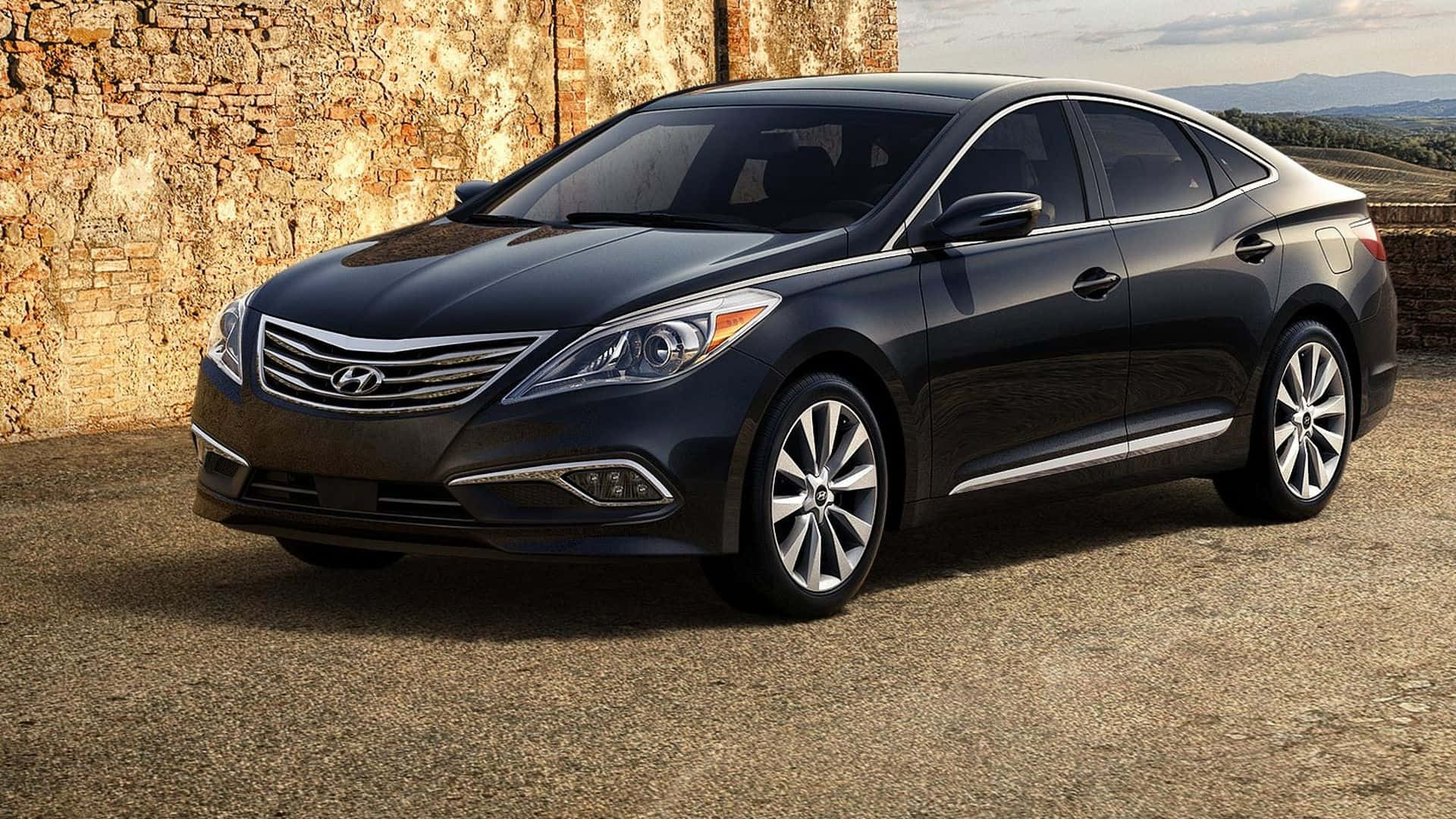 Download Sleek Hyundai Azera on a Stunning Road Trip Wallpaper