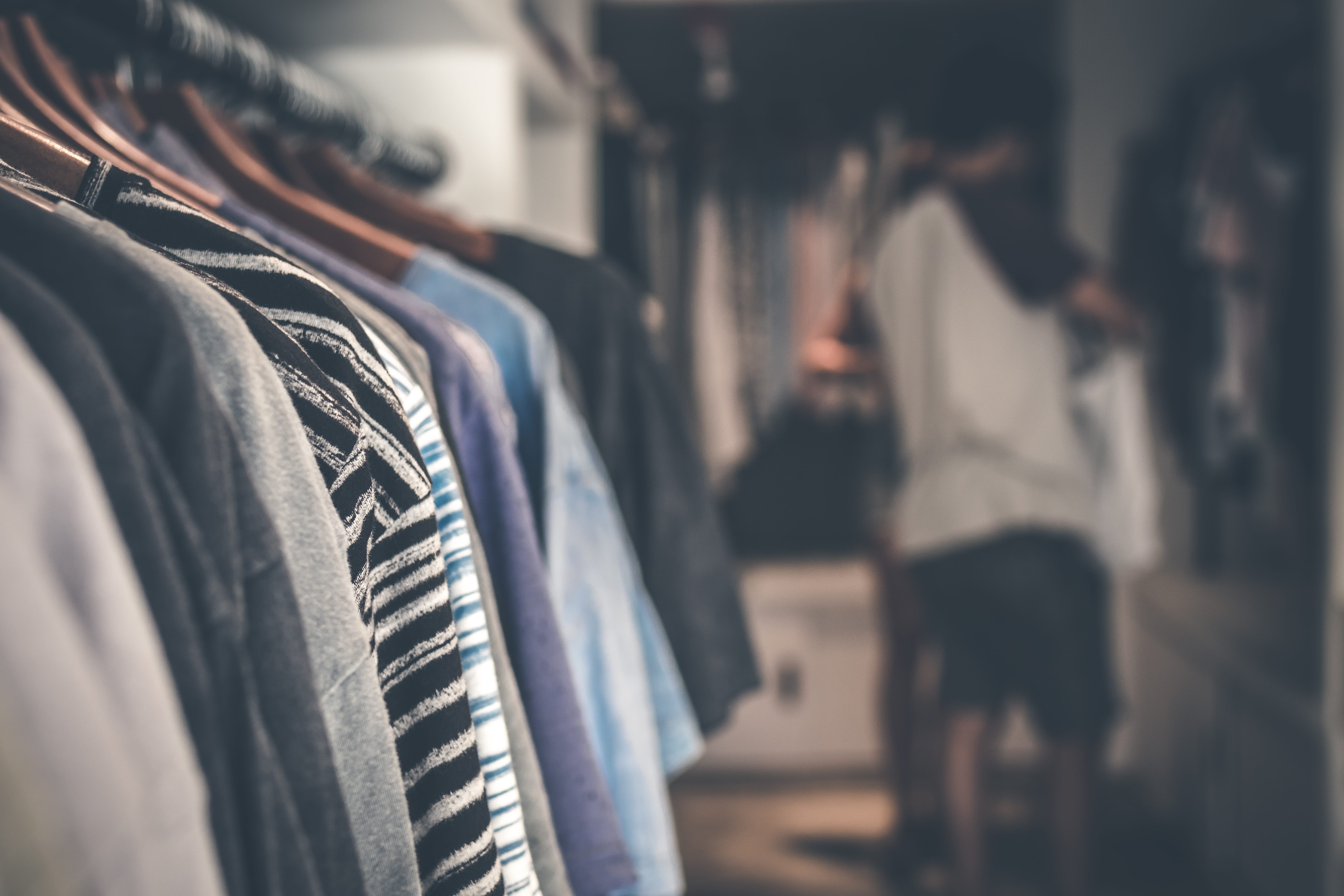 Wallpaper / focus, rack, indoors, focus on foreground, attire, real people, business, choice, collection, hanging, row, fashion, clothes hanger, clothes, retail, consumerism free download