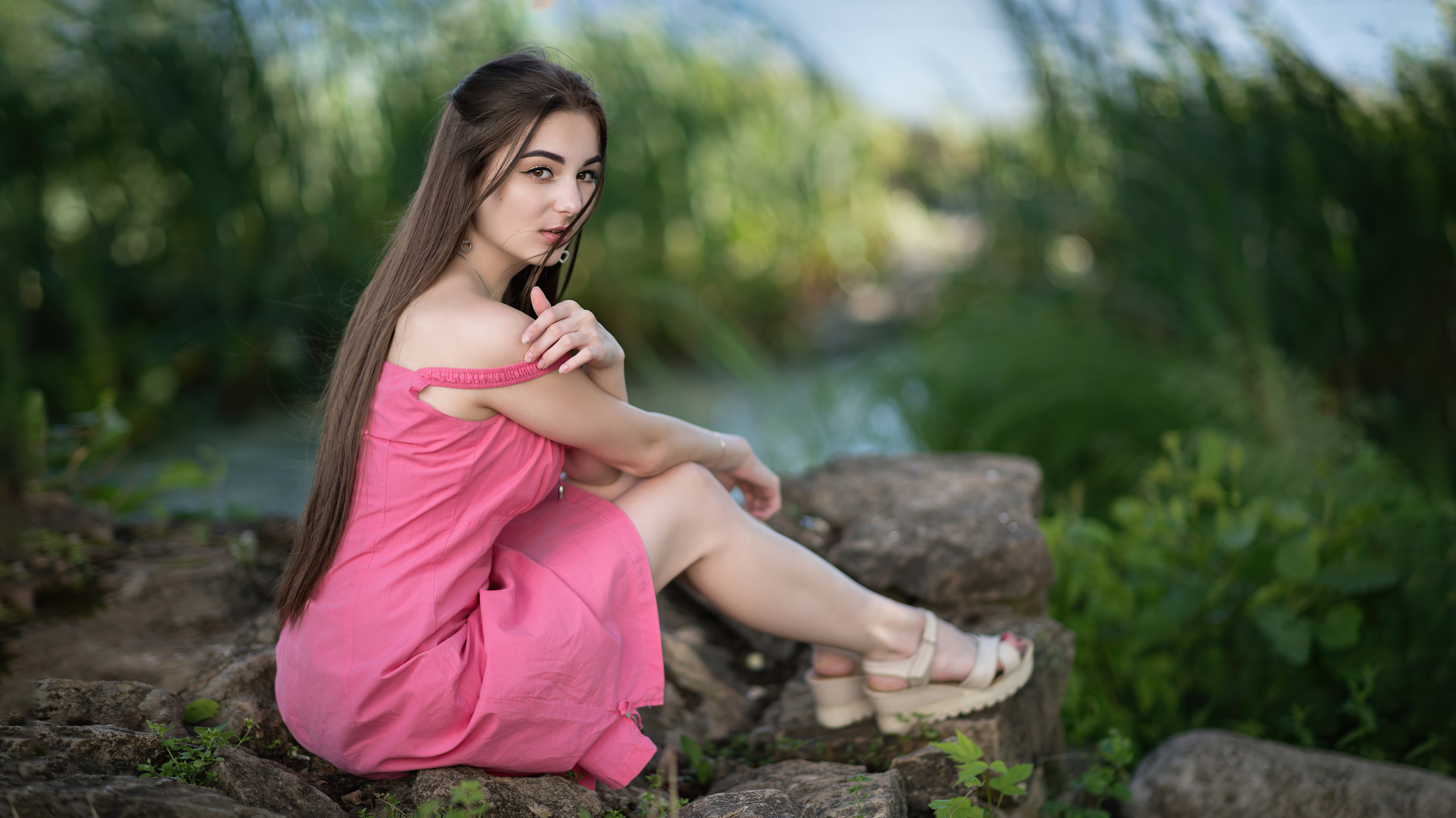 Wallpaper 4k Cute Girl Sitting On Rock In Pink Dress Looking At Viewer 4k Wallpaper