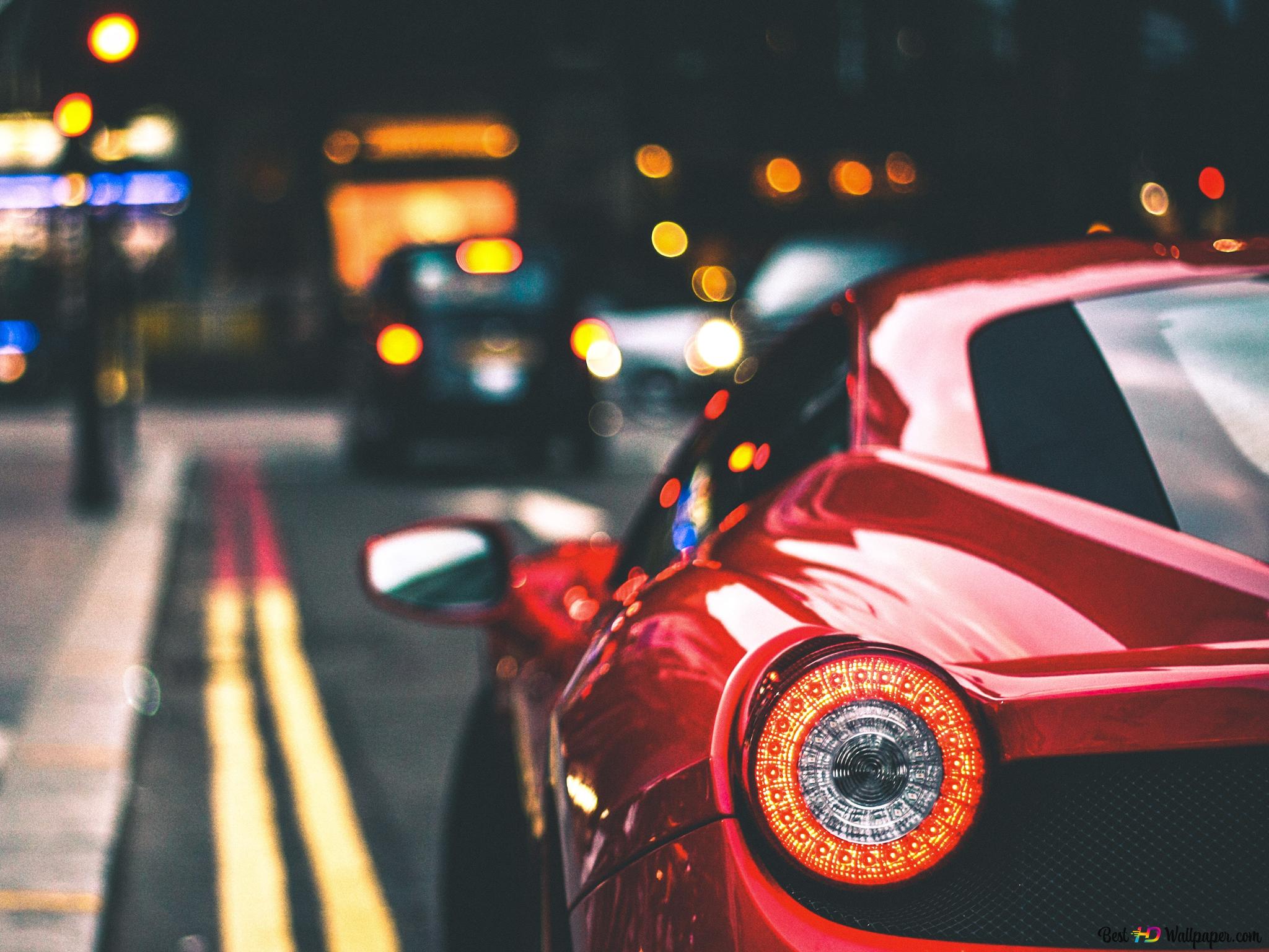 Red sport car on street 4K wallpaper download