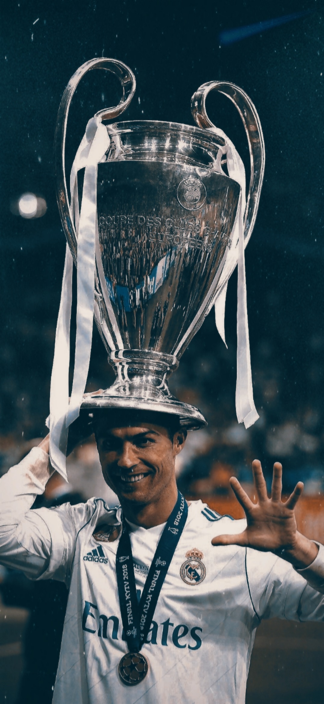 Cr7 holding his champions league trophy Wallpaper Download