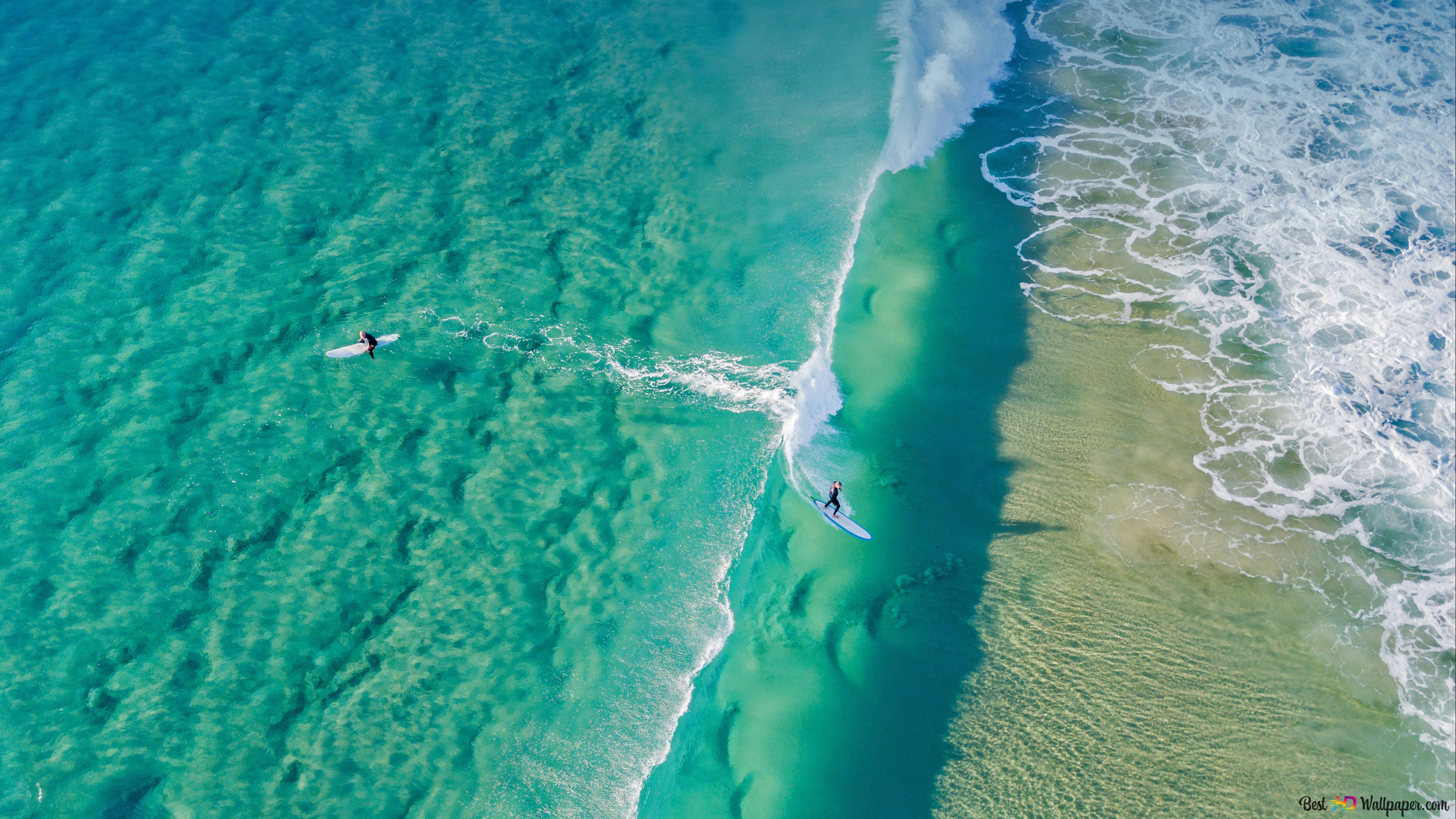 Surfers catching the waves at Palm beach in Gold Coast Queensland Australia 4K wallpaper download