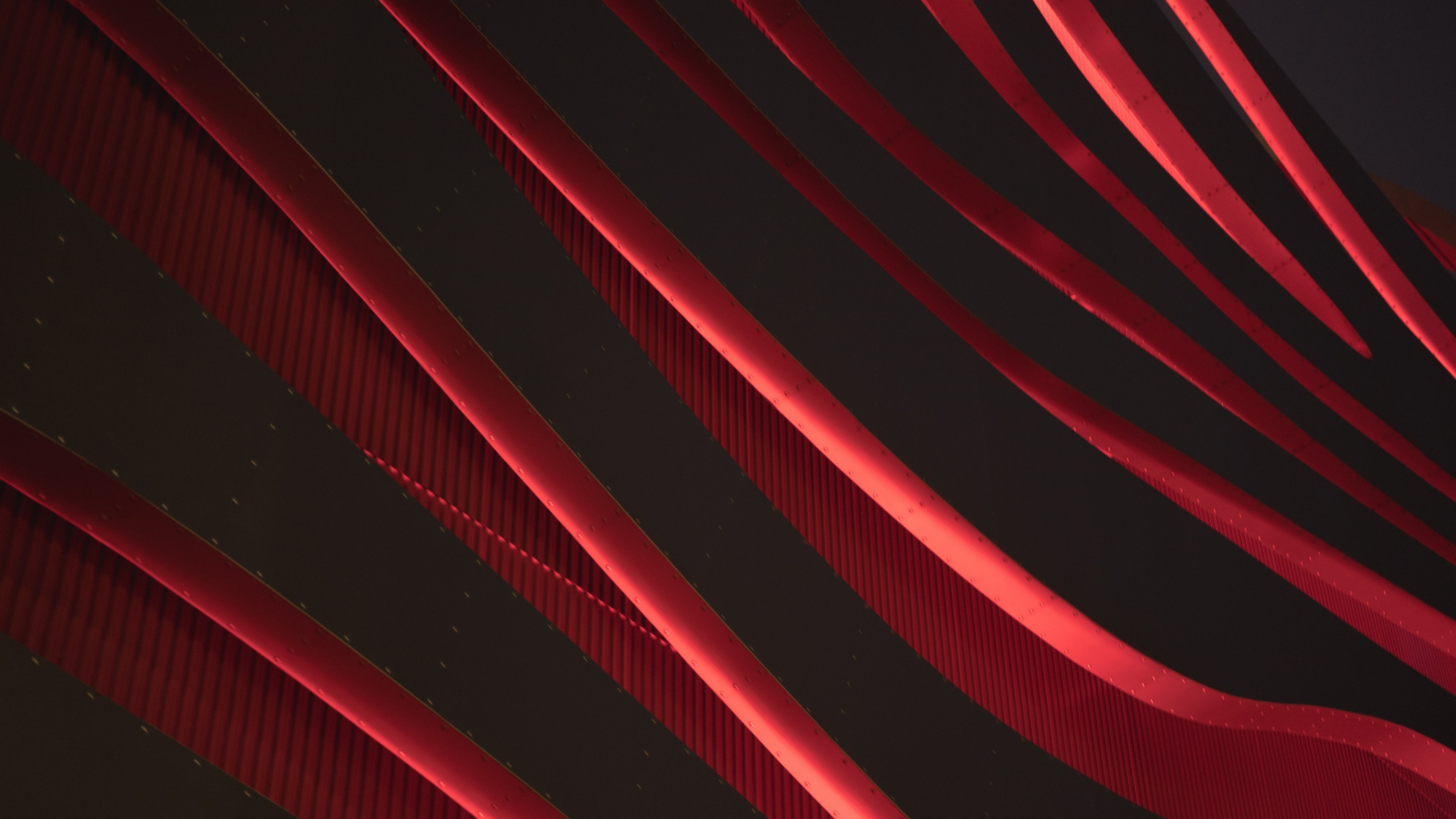 Wallpaper / a red line pattern background from architecture at petersen automotive museum, petersen automotive museum 4k wallpaper free download
