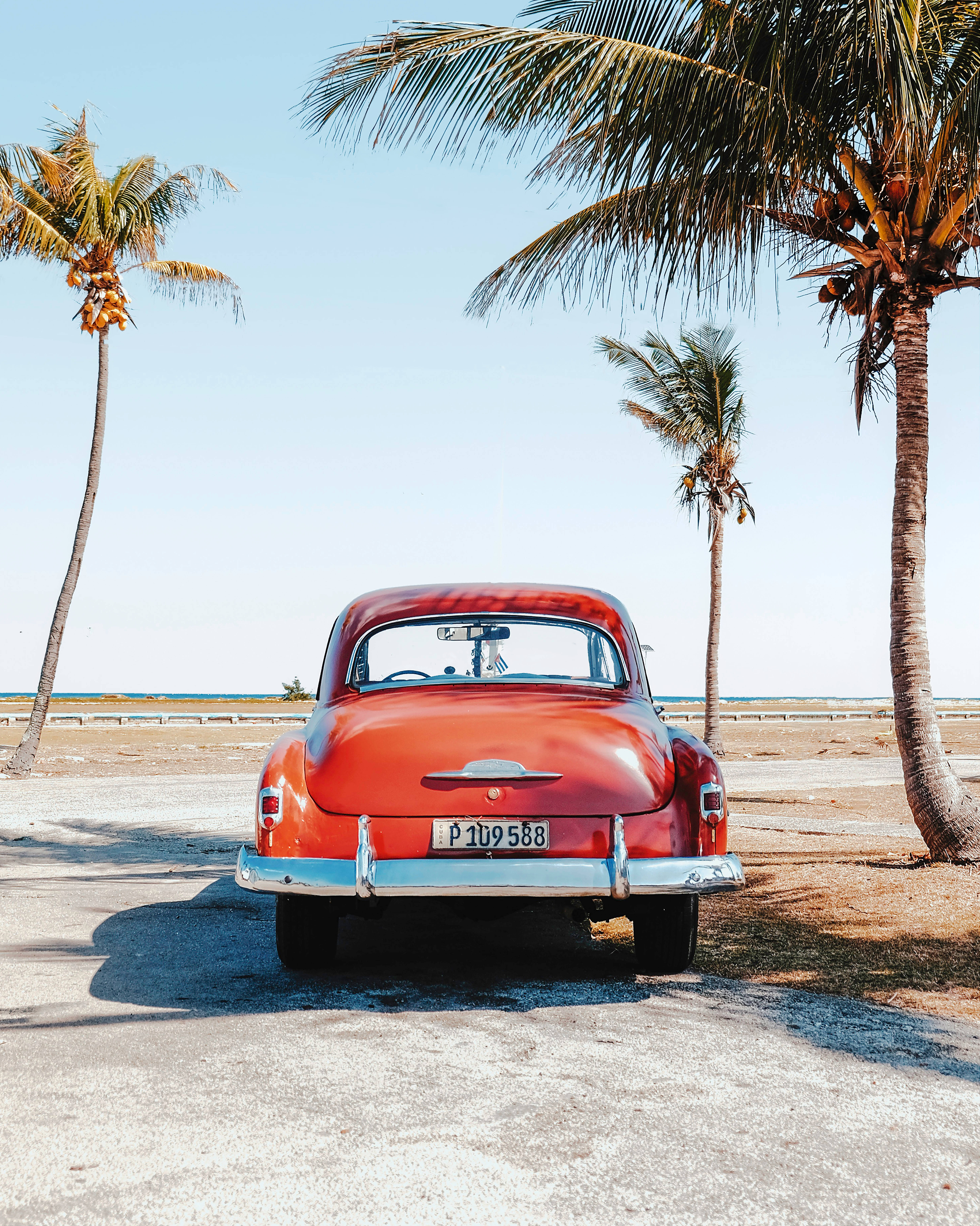 Download Red Classic Car In Cuba Wallpaper