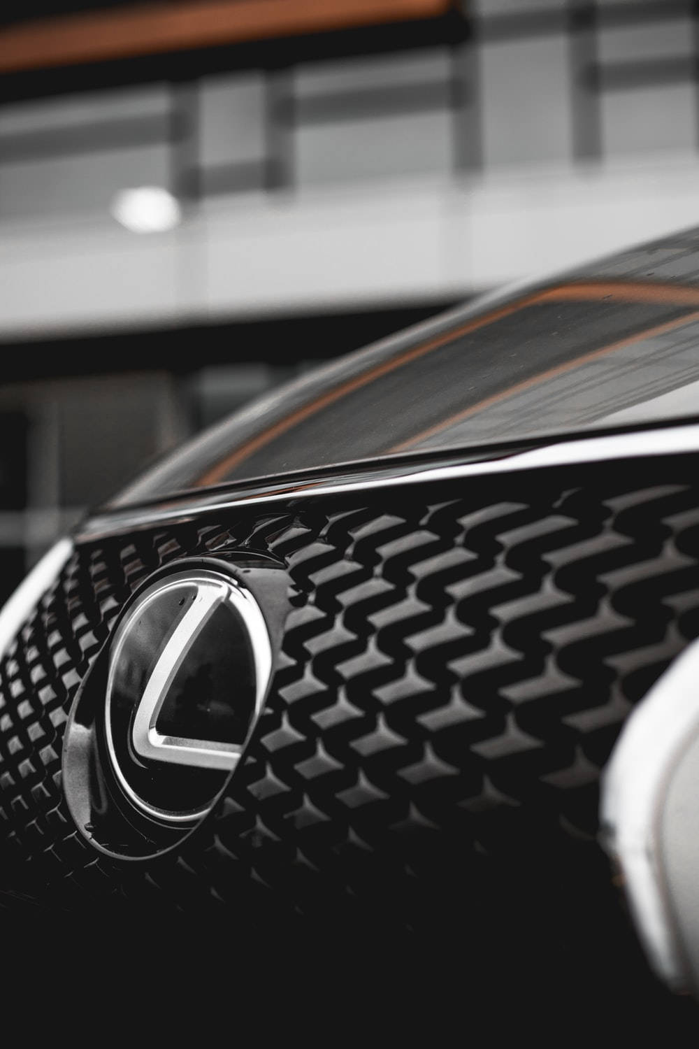 Download Lexus Logo On Car Grille Wallpaper
