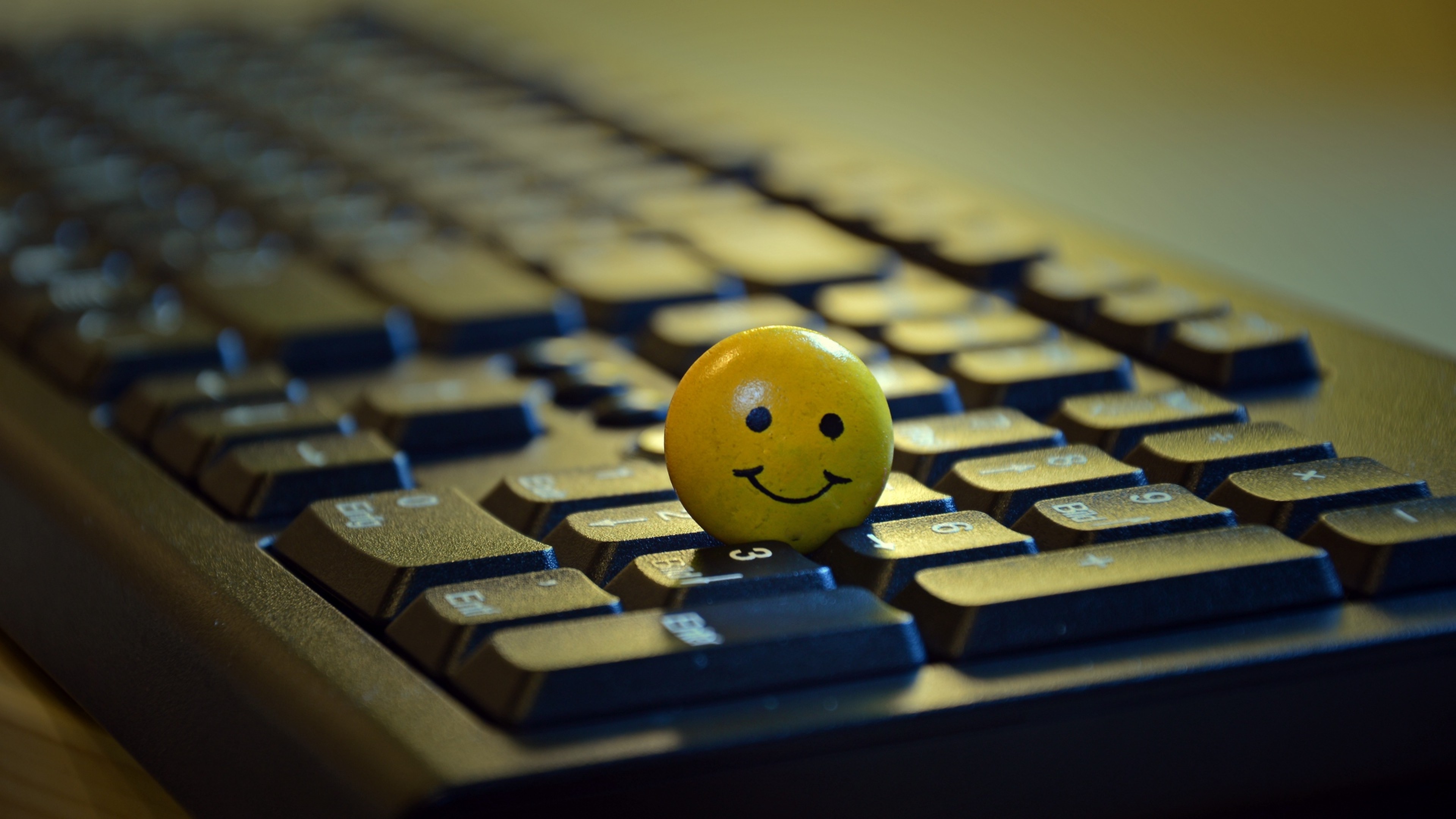 Smiley standing on a keyboard HD Wallpaper 4K Ultra HD