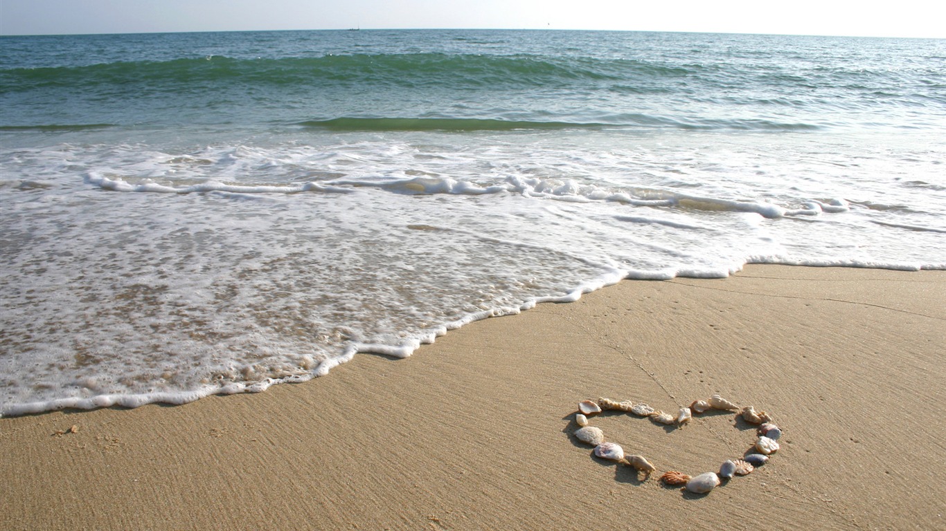 Love On The Beach Surrounded By Heart Shaped Shell
