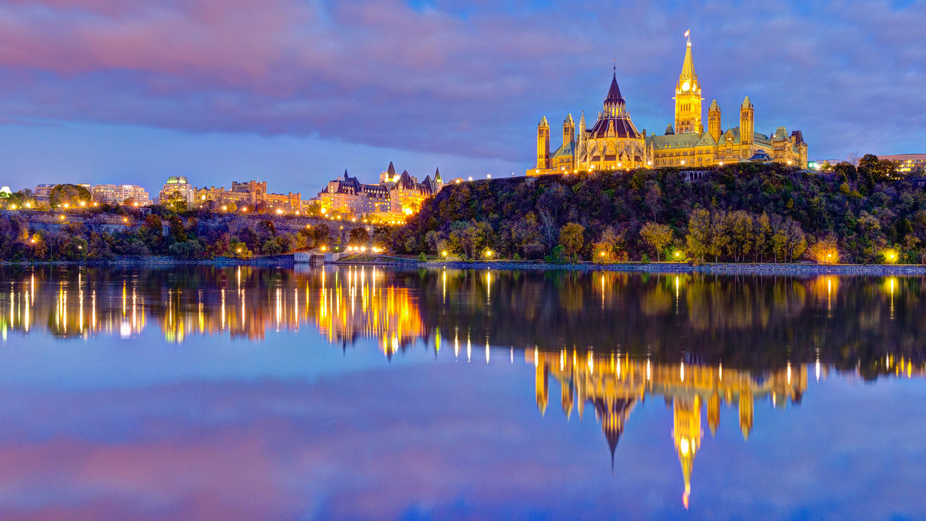 The Parliament buildings across the Ottawa River in Ottawa