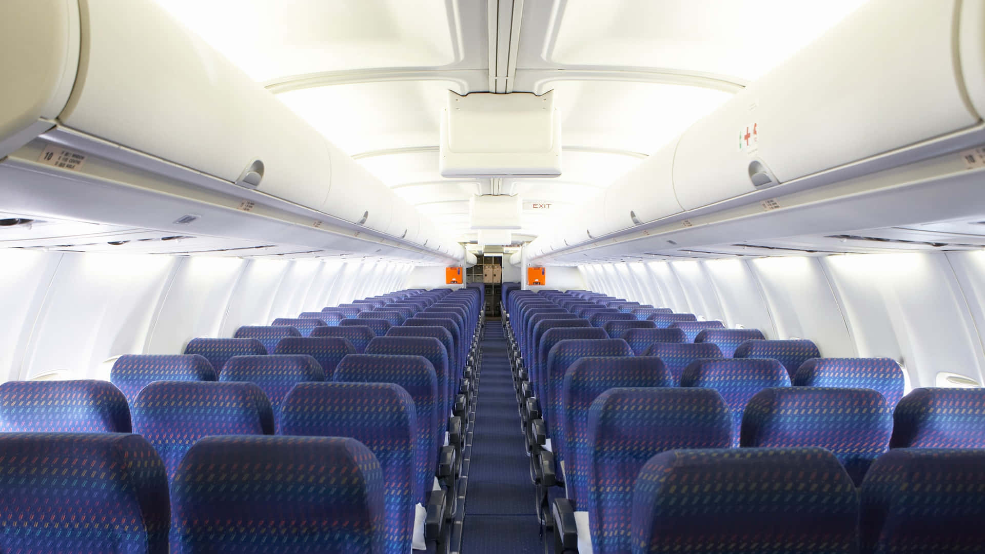 Download Purple Seat Row Inside Airplane Wallpaper