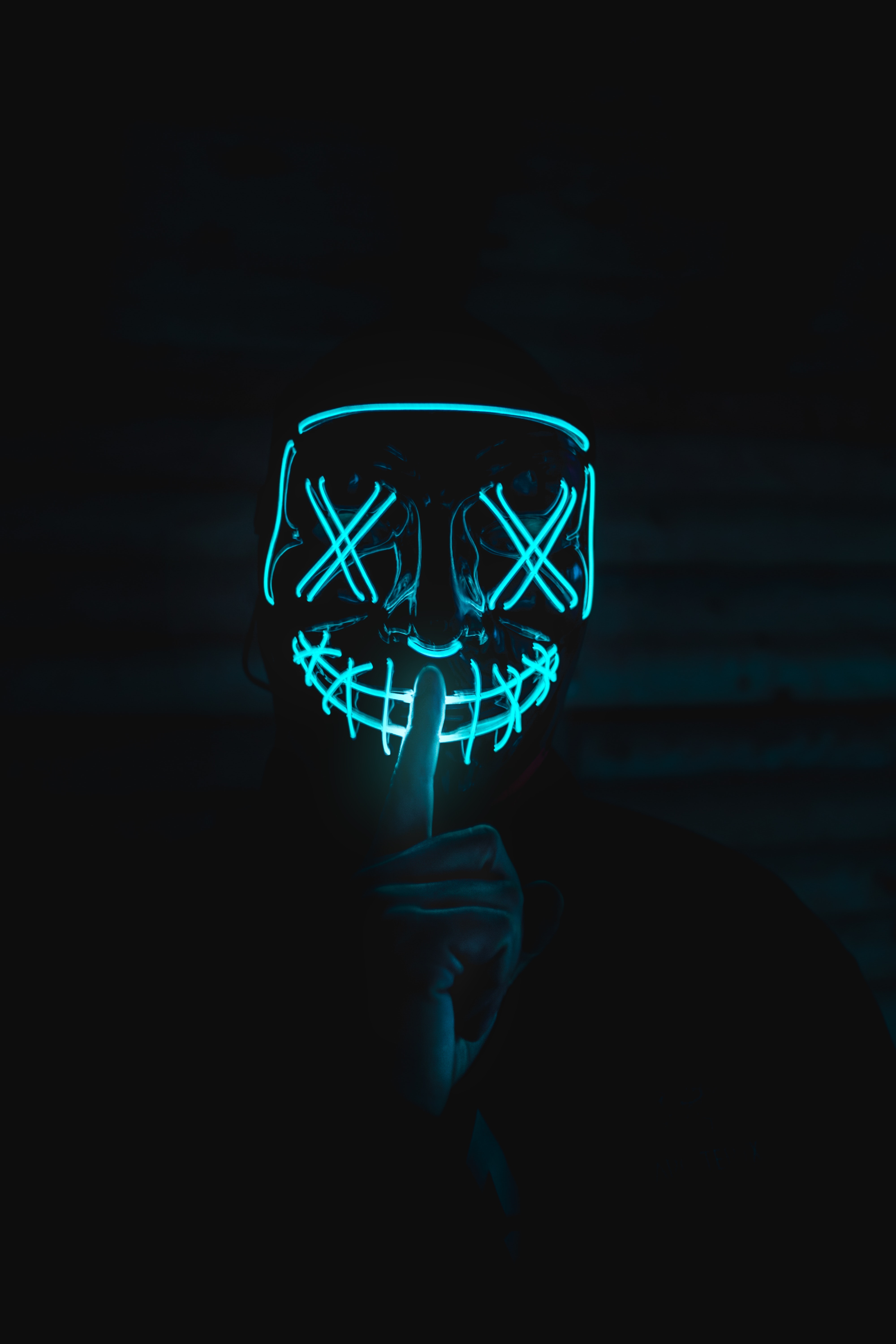 A Person in a Neon Mask · Free