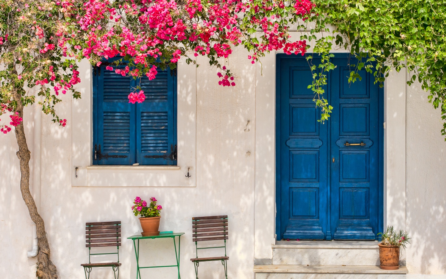 Traditional greek house with flowers