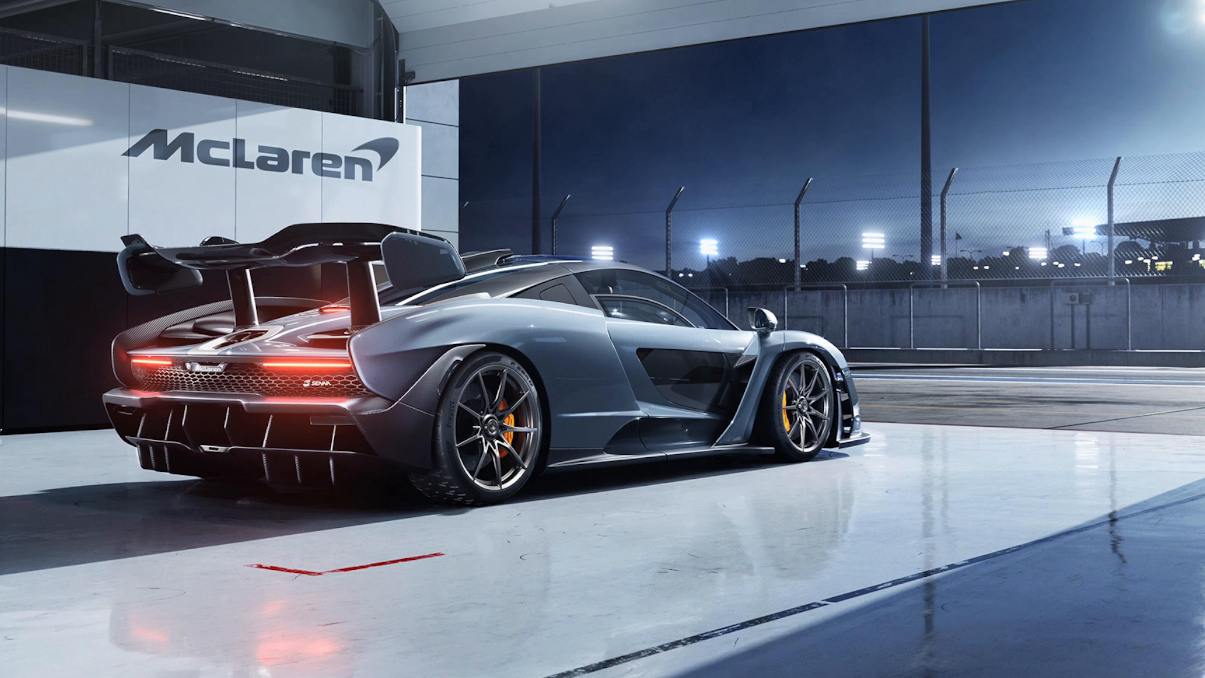 Mclaren Parked With Headlights On Live Wallpaper