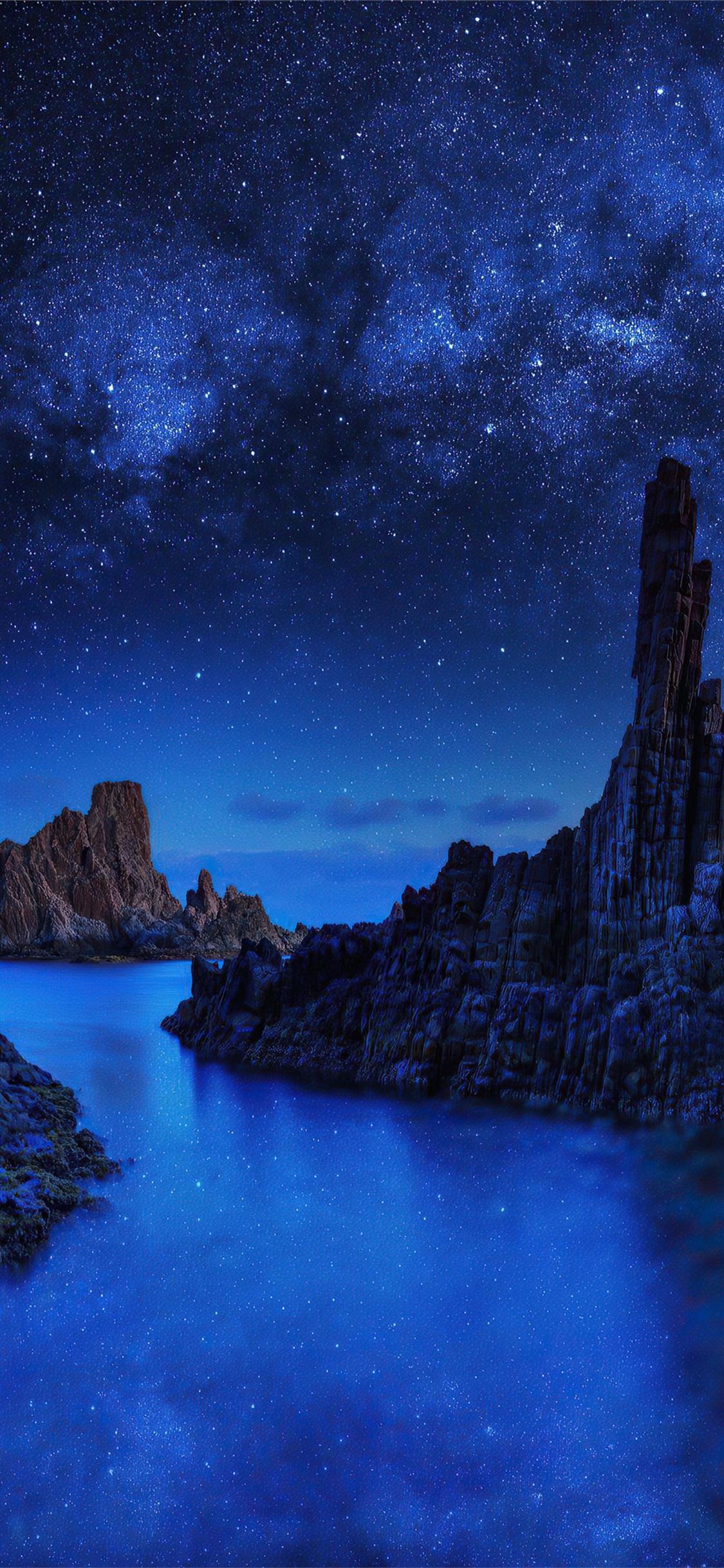 ocean rocks on starry night 4k iPhone X Wallpaper Free Download