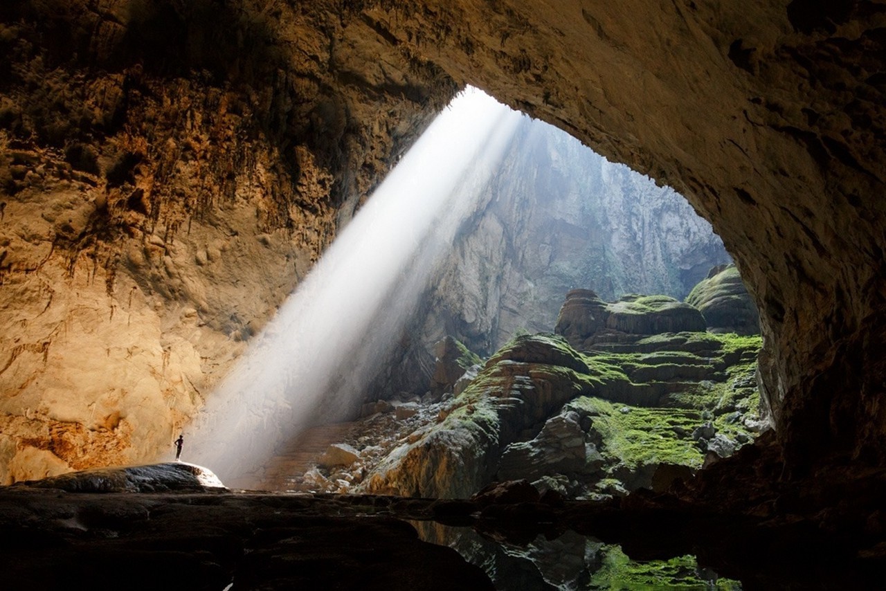 cave hang son doong huge sun rays rock grass nature landscape vietnam Gallery HD Wallpaper