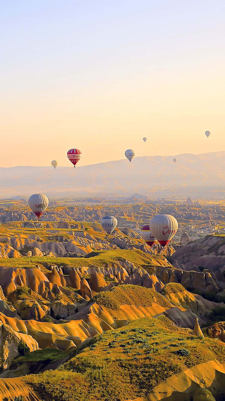 Download Travel iPhone Hot Air Balloons Mountains Wallpaper