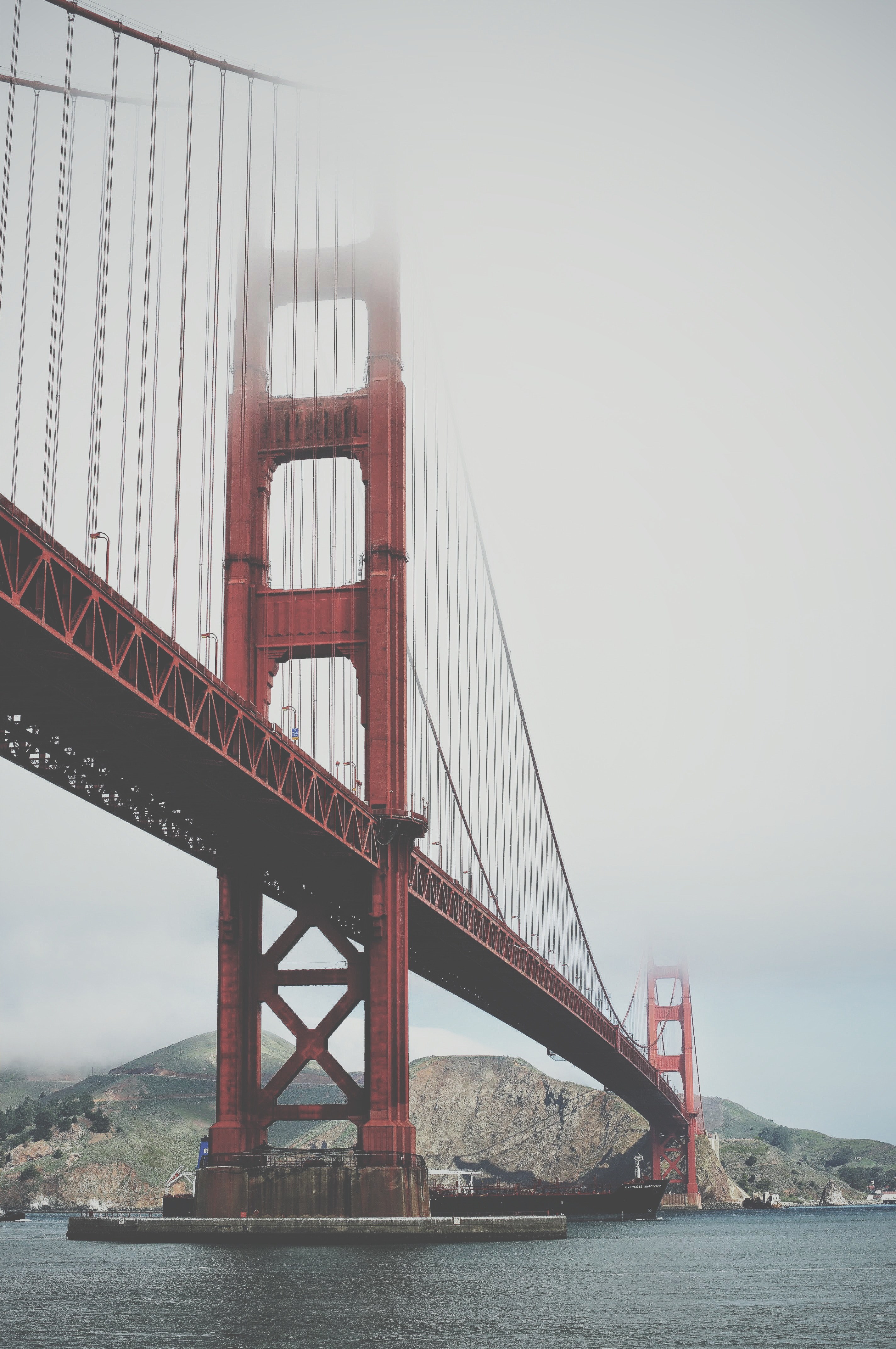 Wallpaper / golden gate bridge disappears into the clouds by the bay, fog over the bay 4k wallpaper free download