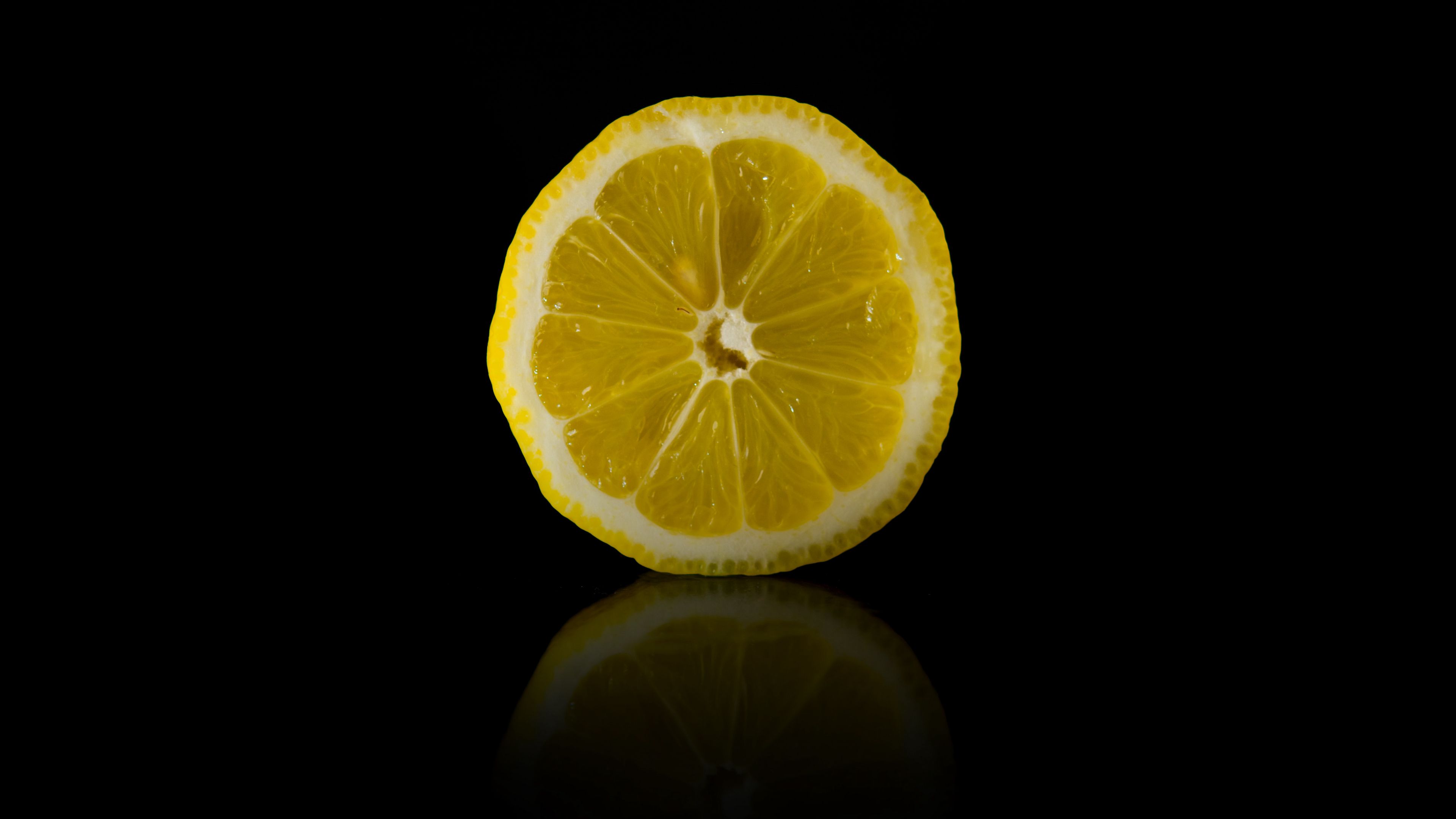 Download wallpaper 3840x2160 lemon, slice, fruit, citrus 4k uhd 16:9 HD background