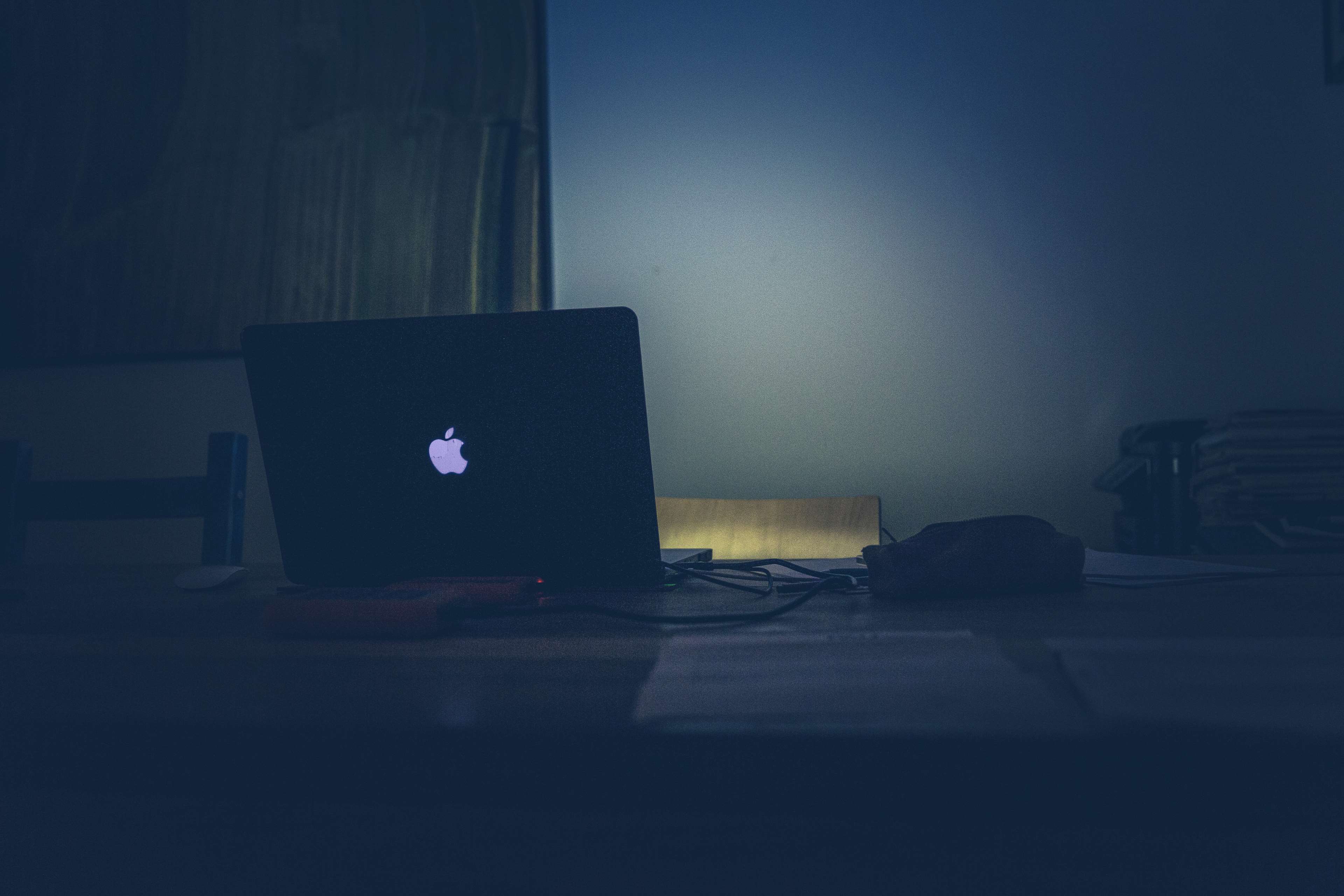 dark, desk, laptop, macbook, room, table, technology, workplace 4k Gallery HD Wallpaper