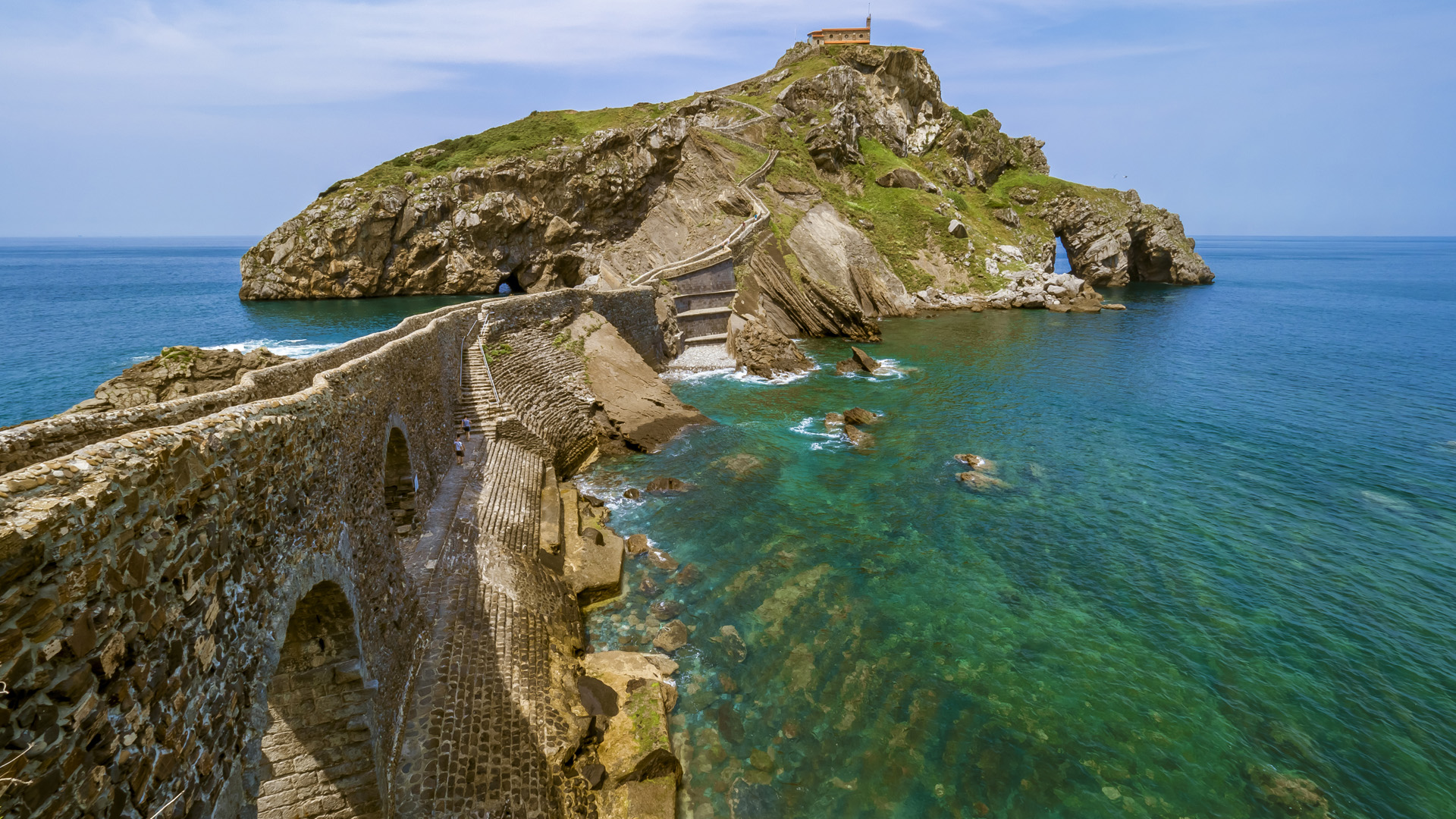 Landscape of coast in the Cantabrian Sea, Gaztelugatxe, Bermeo, Basque Country, Spain. Windows Spotlight Image