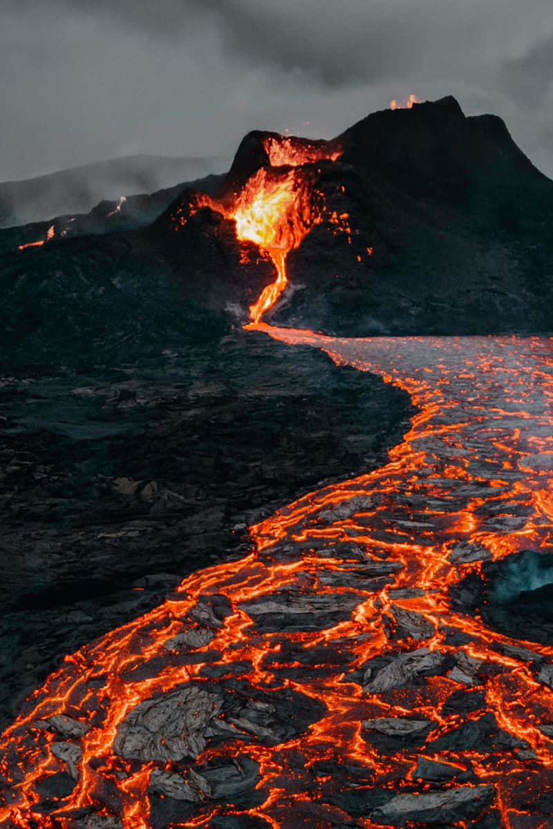 Download Firey lava flows swirling in the depths of an active volcano