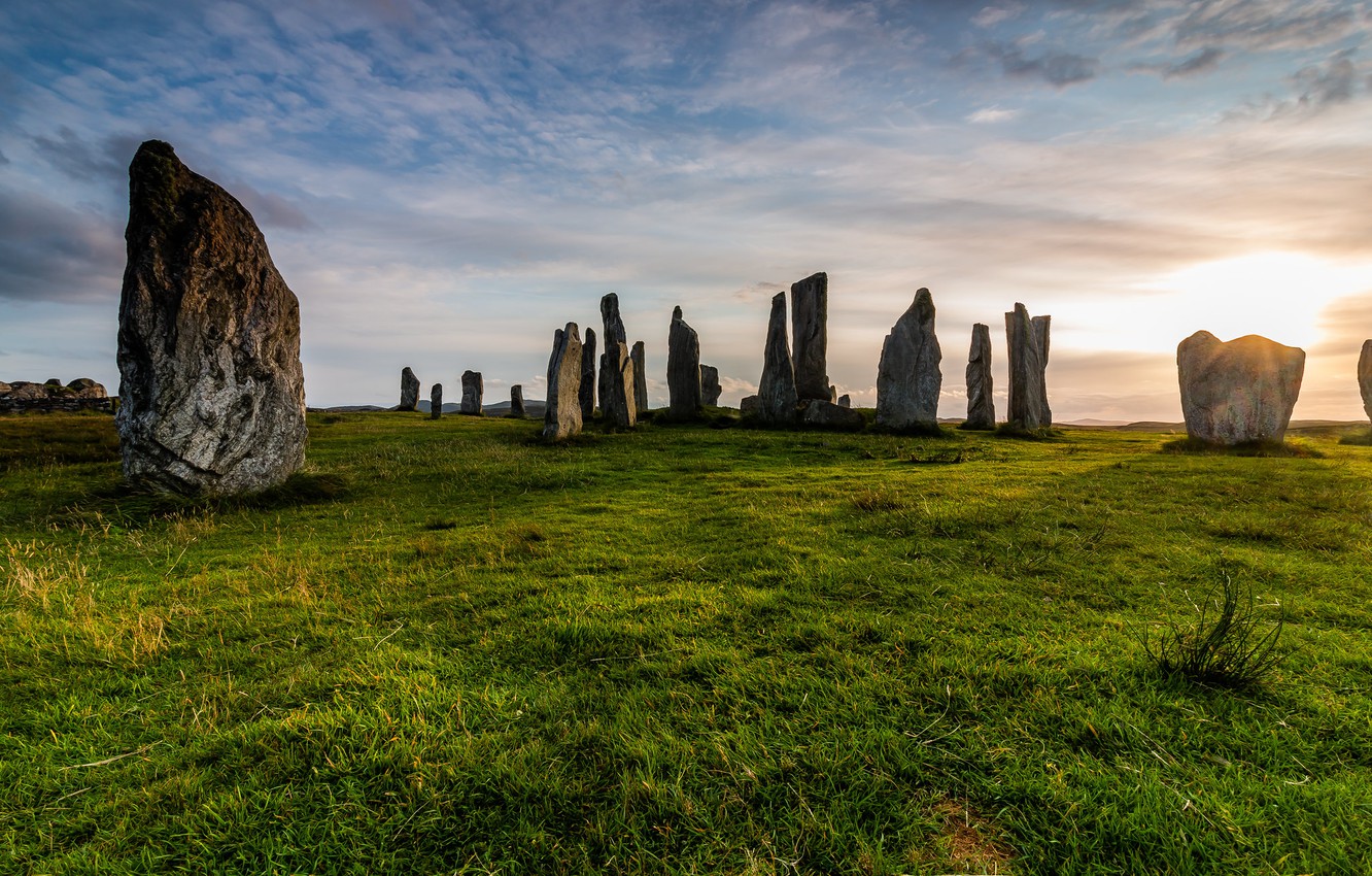 Tracy Hogan Standing Stones sunset. The standing stones were erected in the Neolithic period 5000 years ago. Isle of Lewis, Scotland