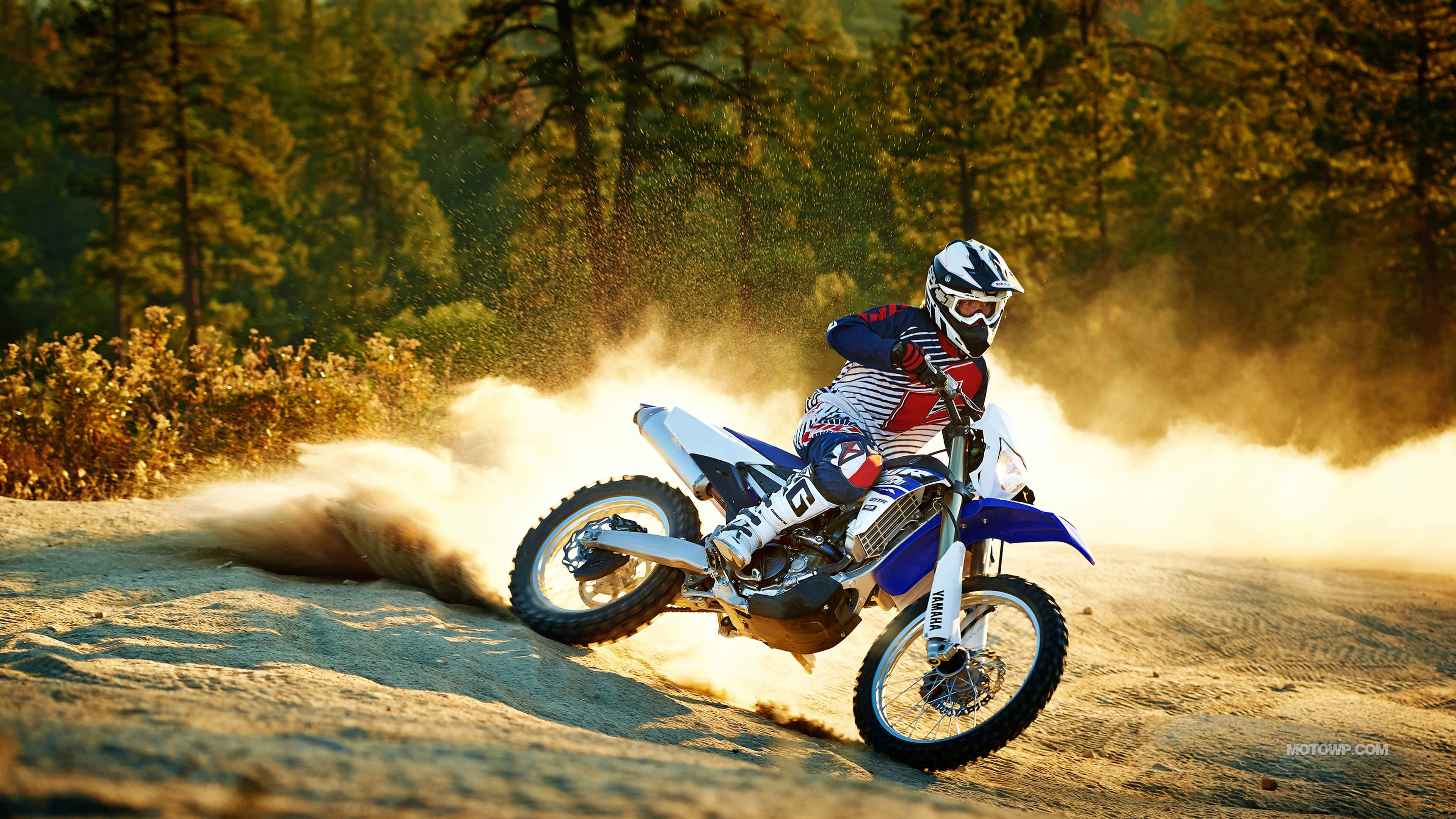 Wallpaper Man Riding Motocross Dirt Bike on Dirt Road During Daytime, Background Free Image