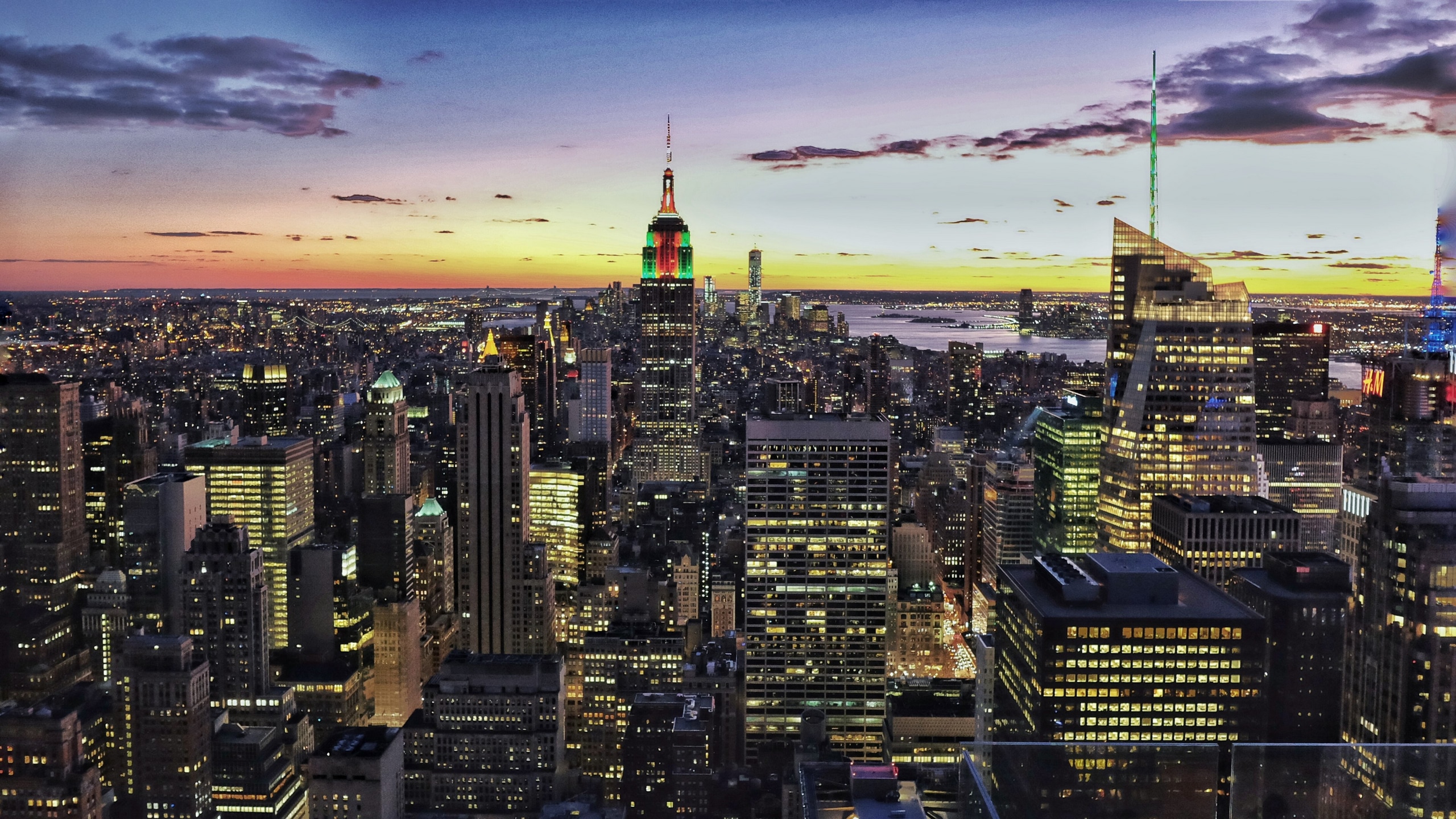 Wallpaper / view of the new york city skyline from top of the rock at sunset, the city at sunset 4k wallpaper free download
